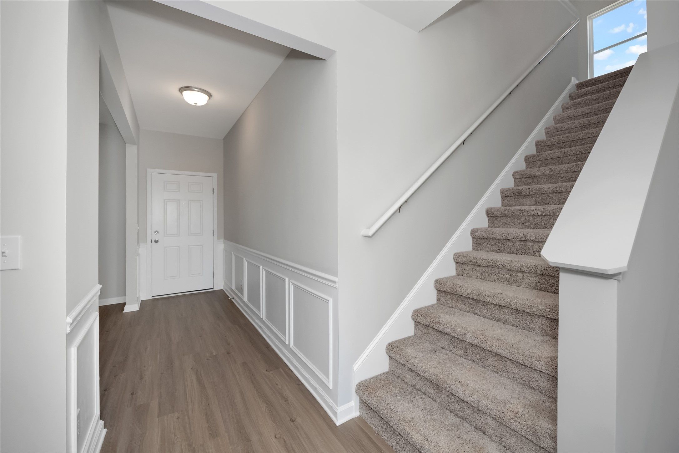 The Harrington- Stairway to second floor. Sample image for illustration; upgrades, options, and col