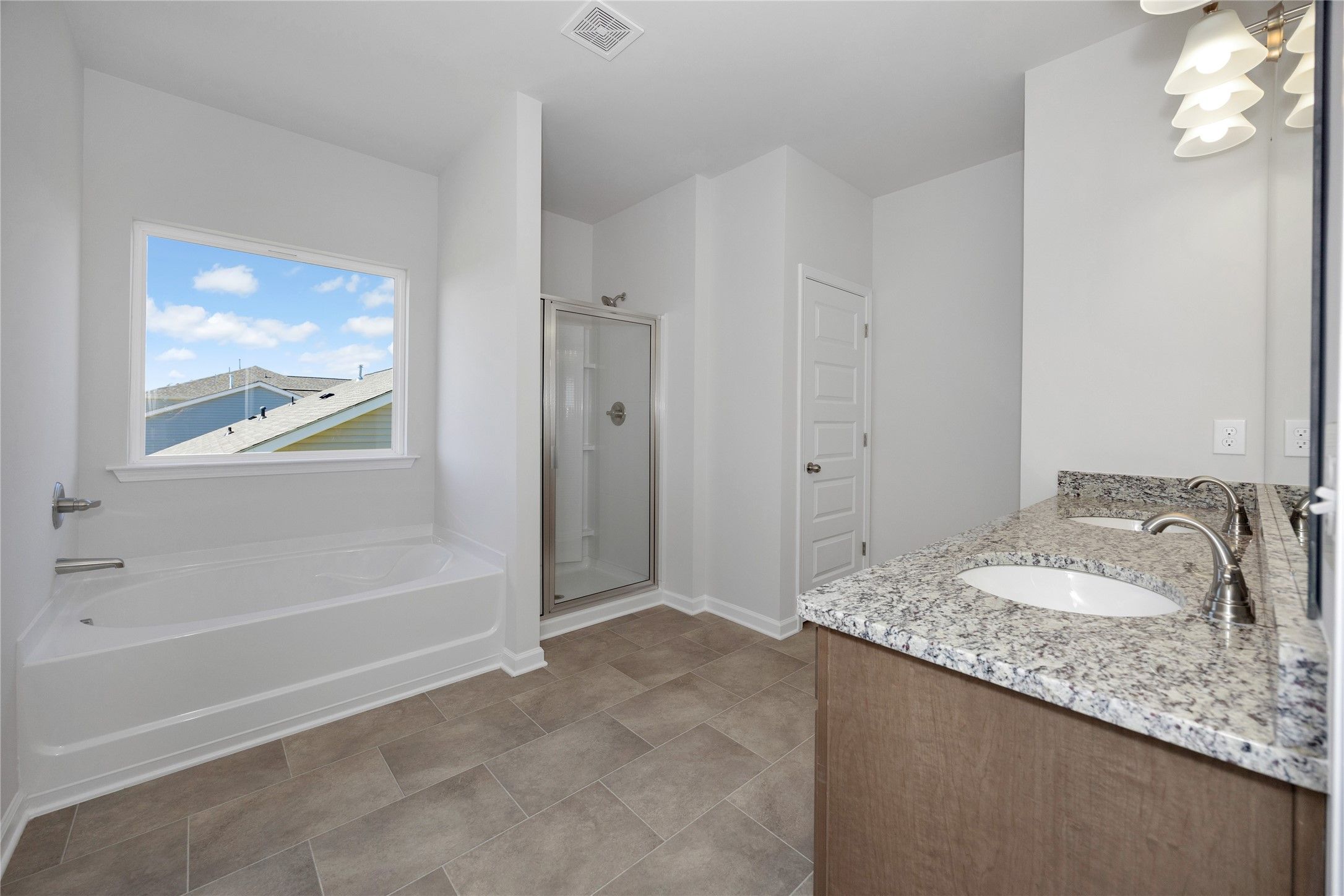 The Harrington- Primary Bath with separate tub and shower. Sample image for illustration; upgrades,