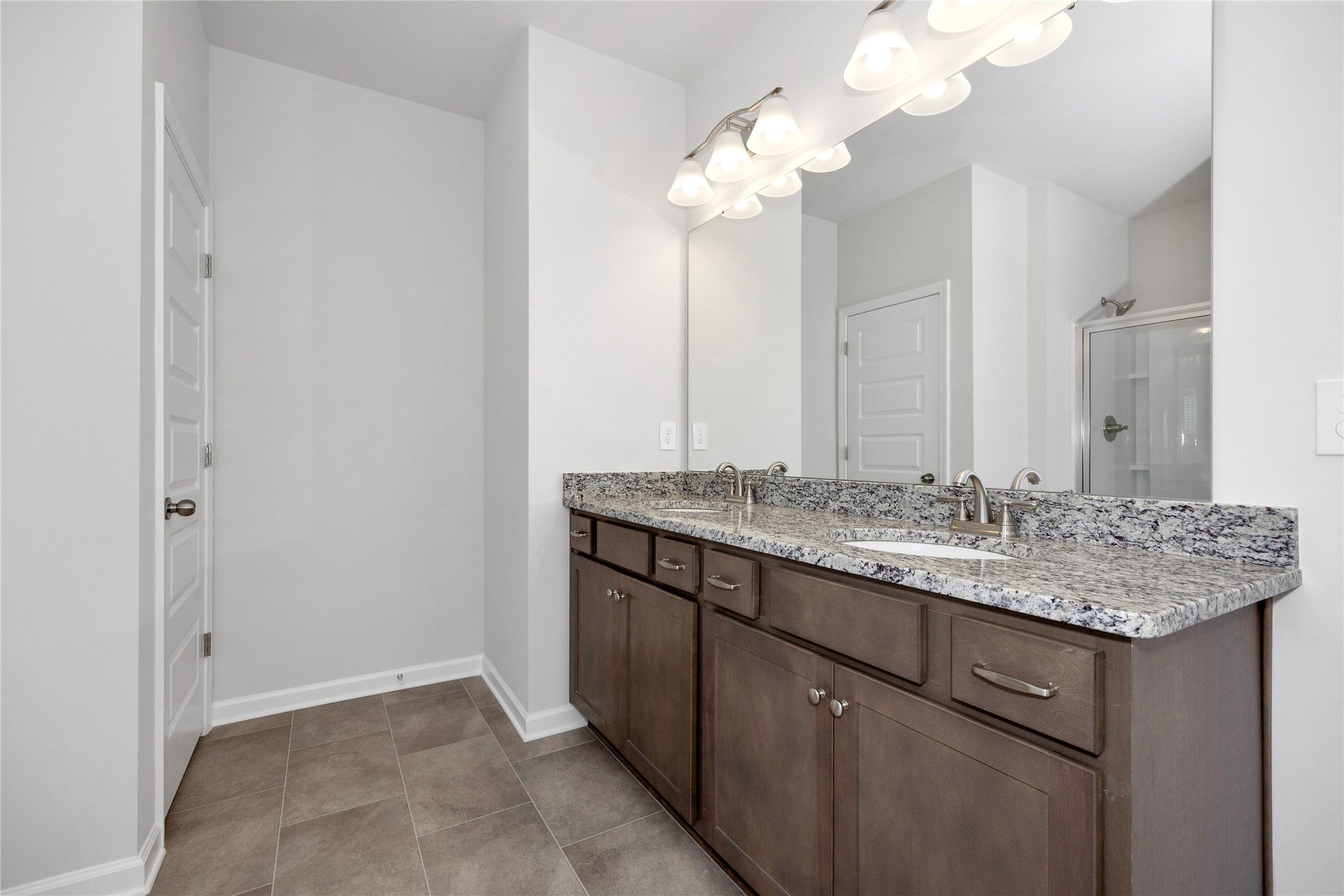 The Harrington- Primary Bath with dual sinks. Sample image for illustration; upgrades, options, and