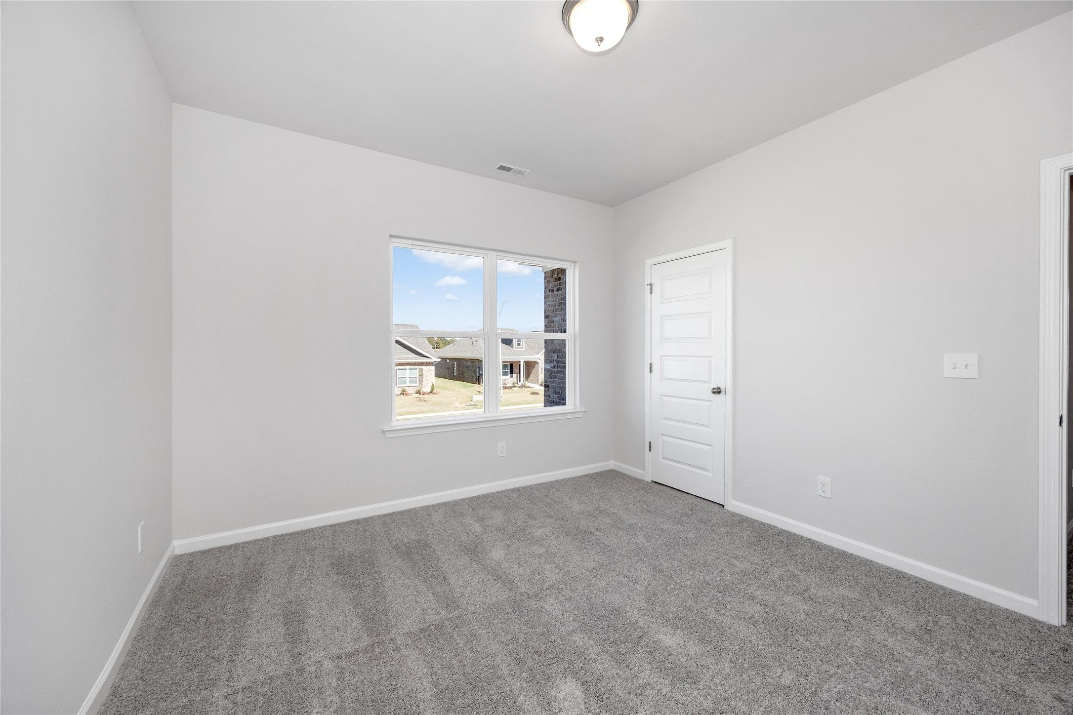 The Harrington- Bedroom 2. Sample image for illustration; upgrades, options, and colors may vary.