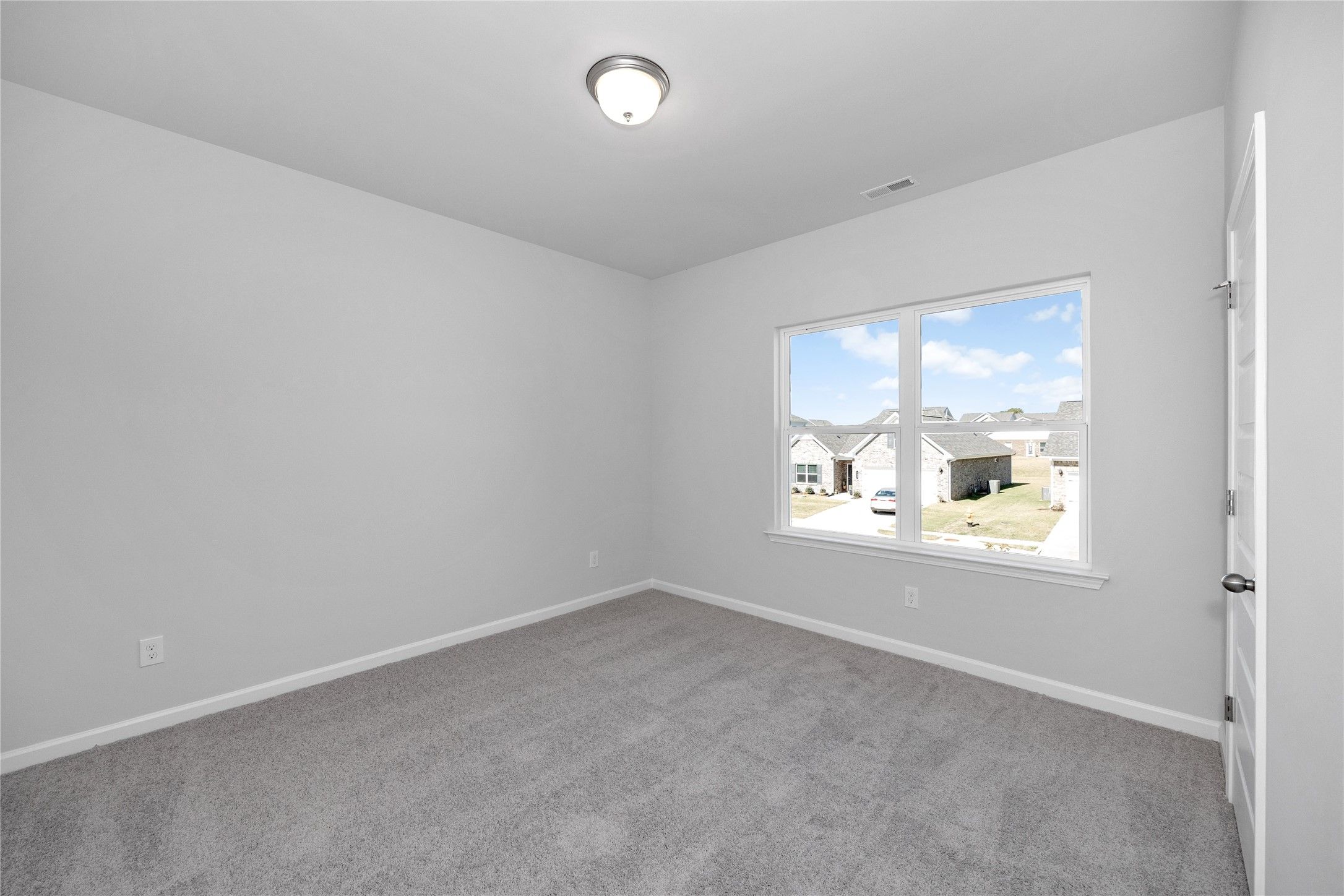 The Harrington- Bedroom 2. Sample image for illustration; upgrades, options, and colors may vary.