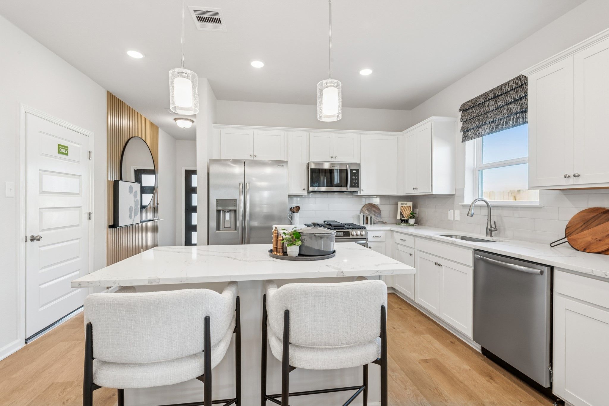 Kitchen. Staged model home shown for illustration only; actual features, colors, and upgrades may v