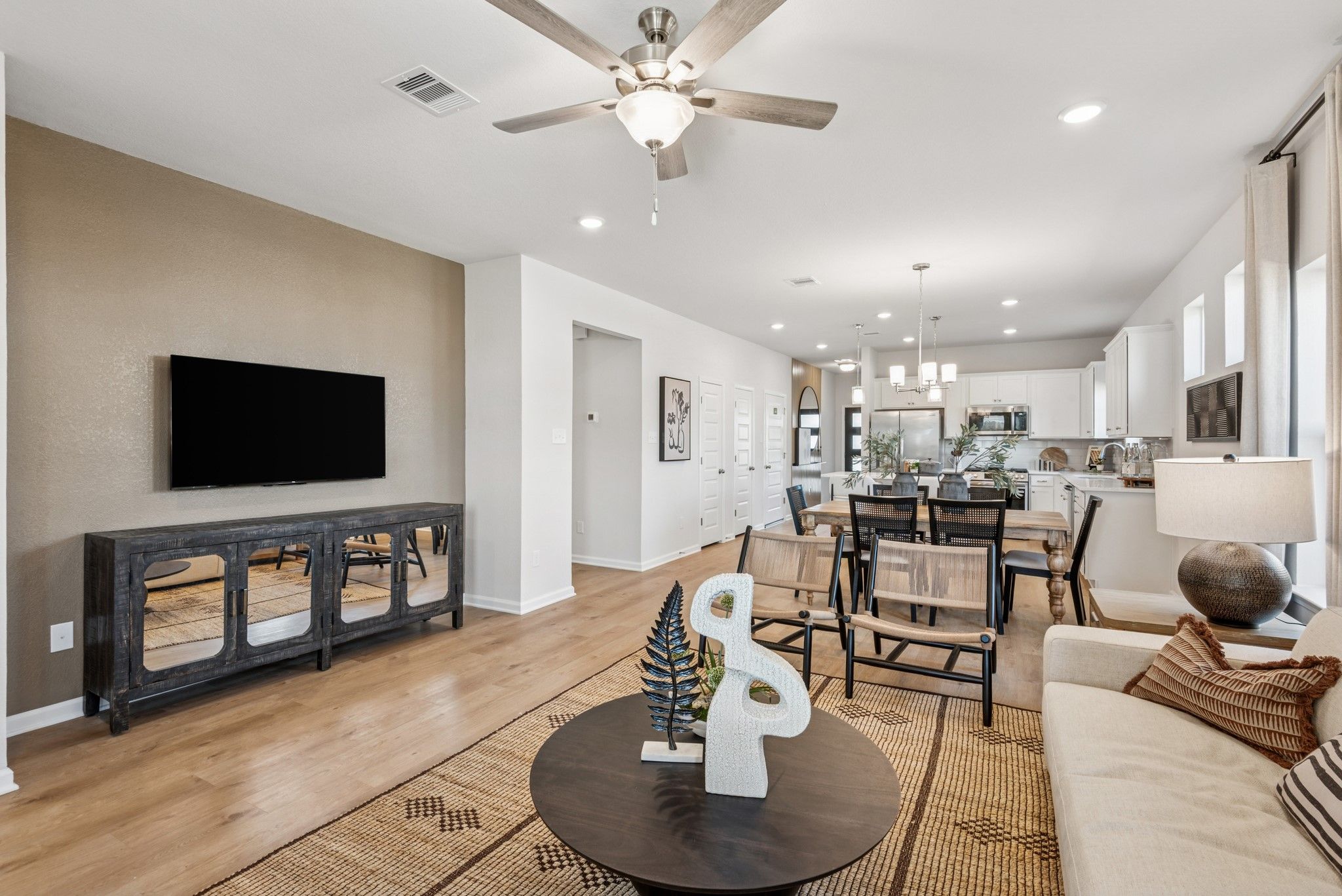 Family Room. Staged model home shown for illustration only; actual features, colors, and upgrades m