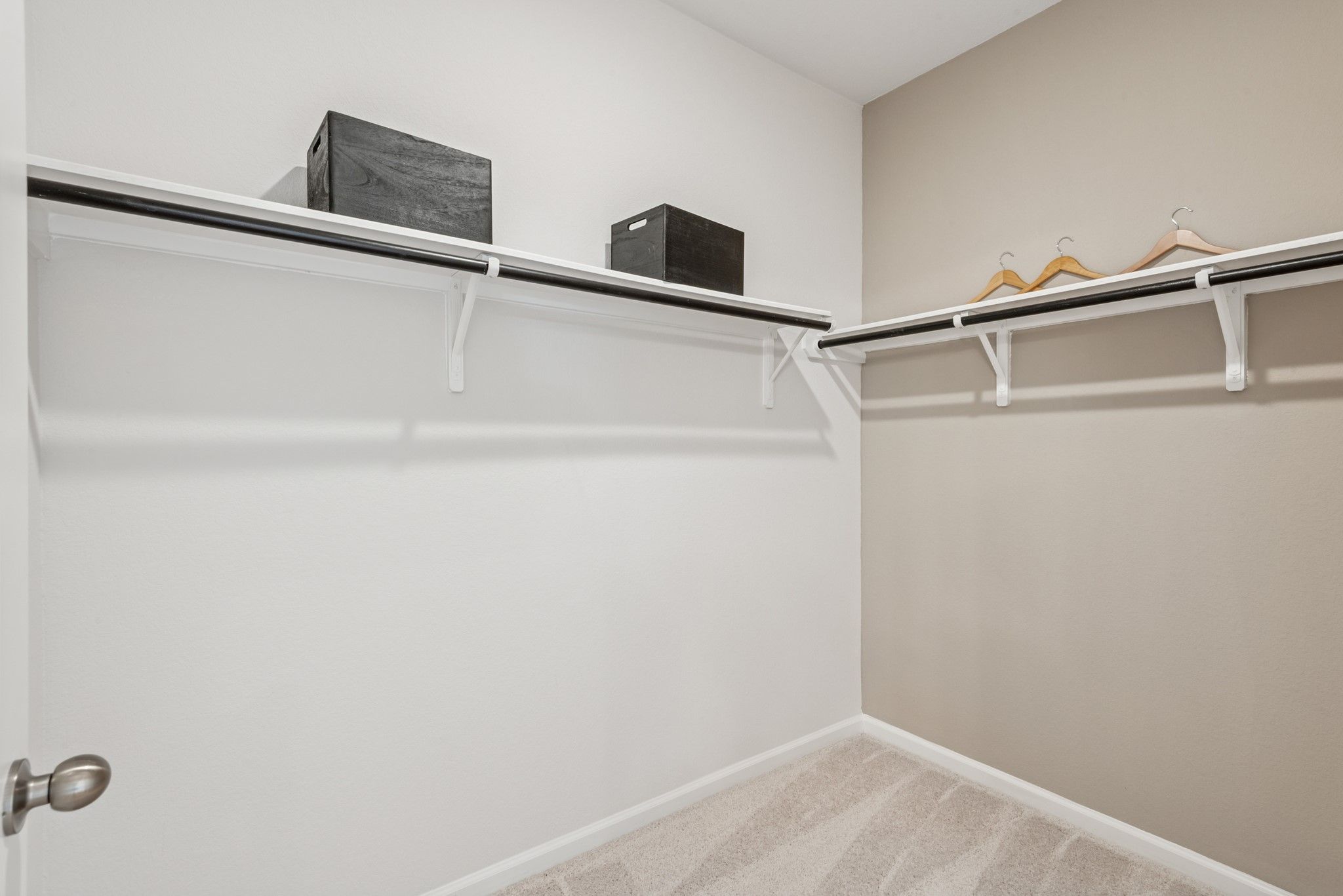 Primary Walk-In Closet. Staged model home shown for illustration only; actual features, colors, an