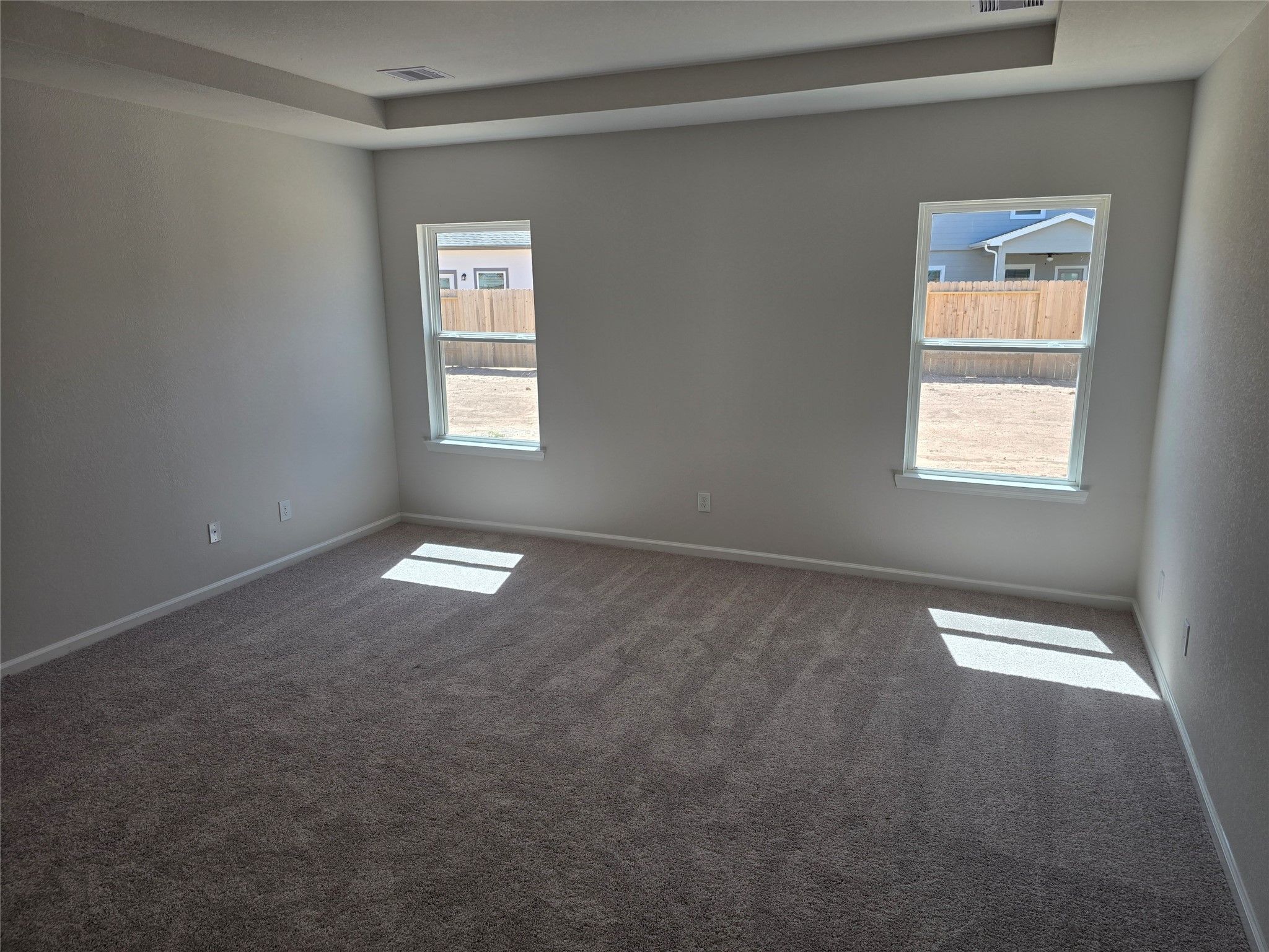 The Shetland III- Primary Suite (Tray ceiling not included). Home under construction, photo used fo