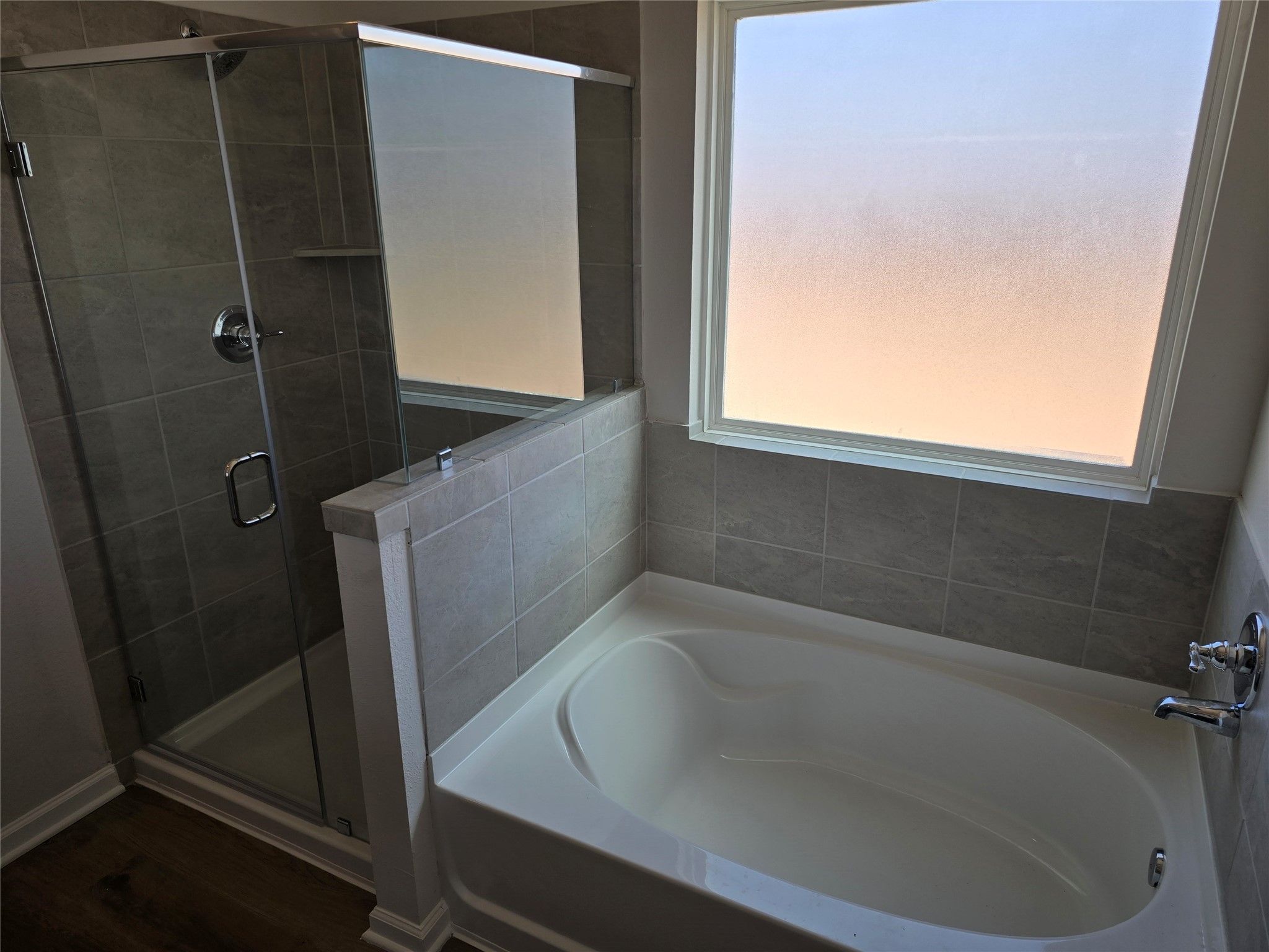 The Shetland III- Primary Bathroom with garden tub and separate shower.  included). Home under cons