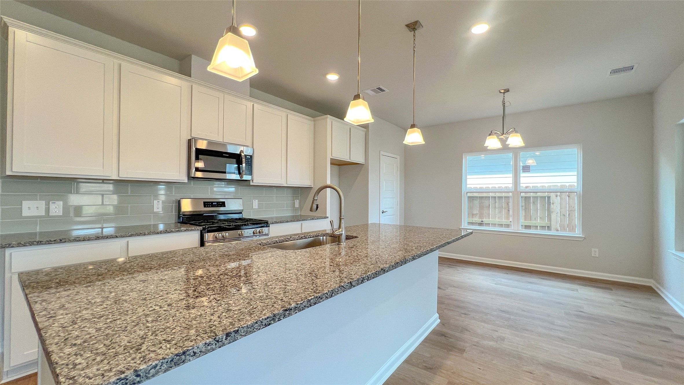 The Brambling- Kitchen. Sample floor plan image for illustration; upgrades, options, and colors may