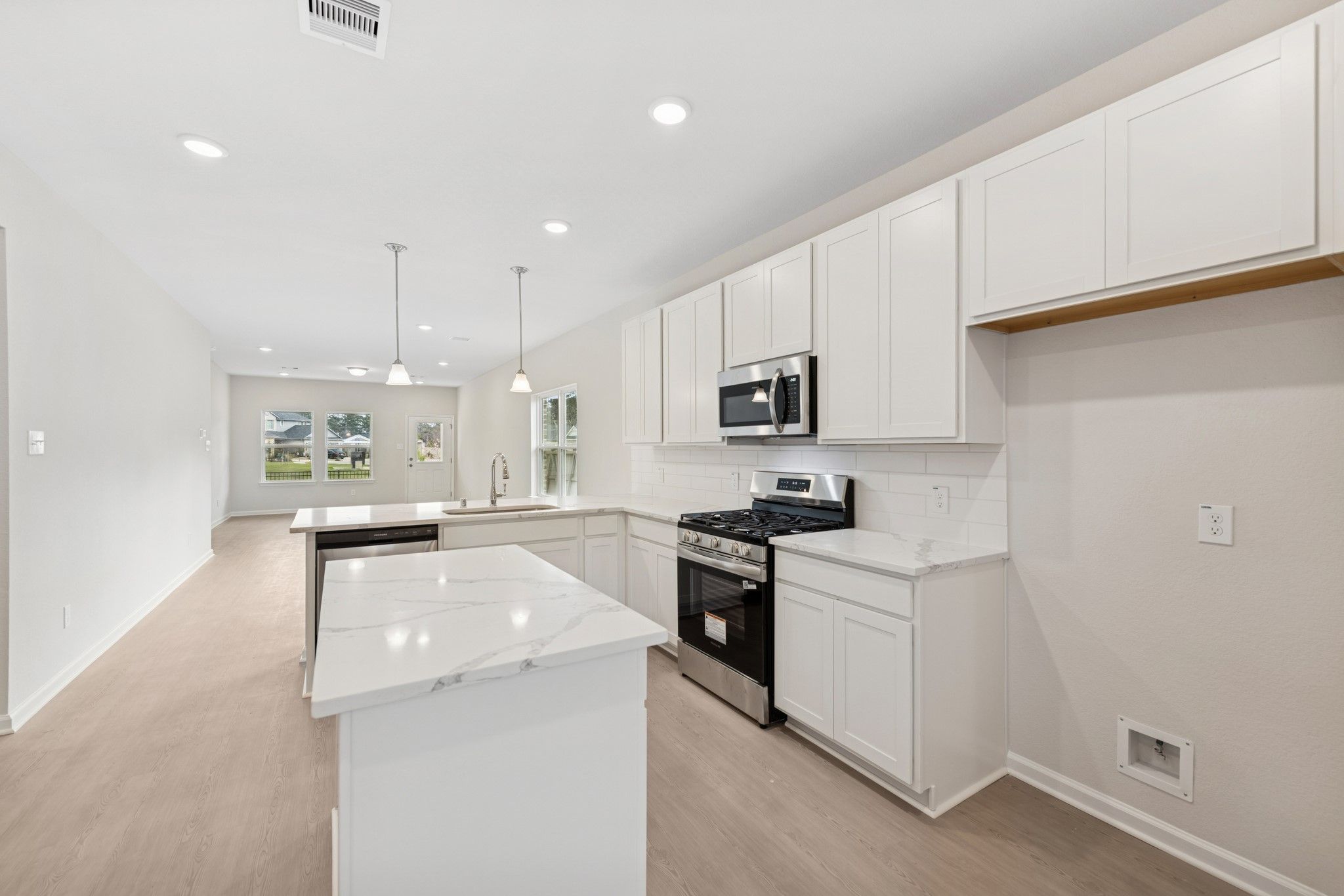 The Cardinal II- Kitchen. Photos of home shown are for illustration only; actual features, colors,