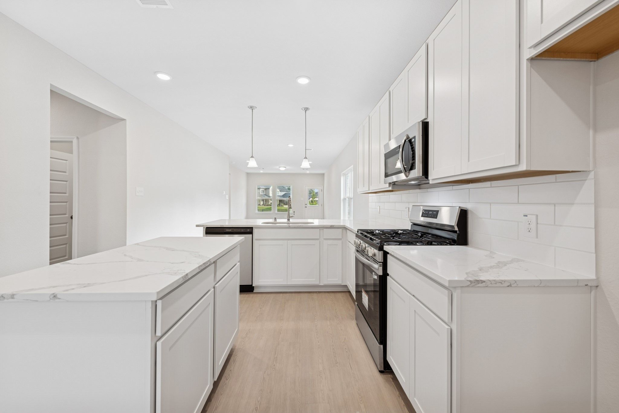 The Cardinal II- Kitchen. Photos of home shown are for illustration only; actual features, colors,