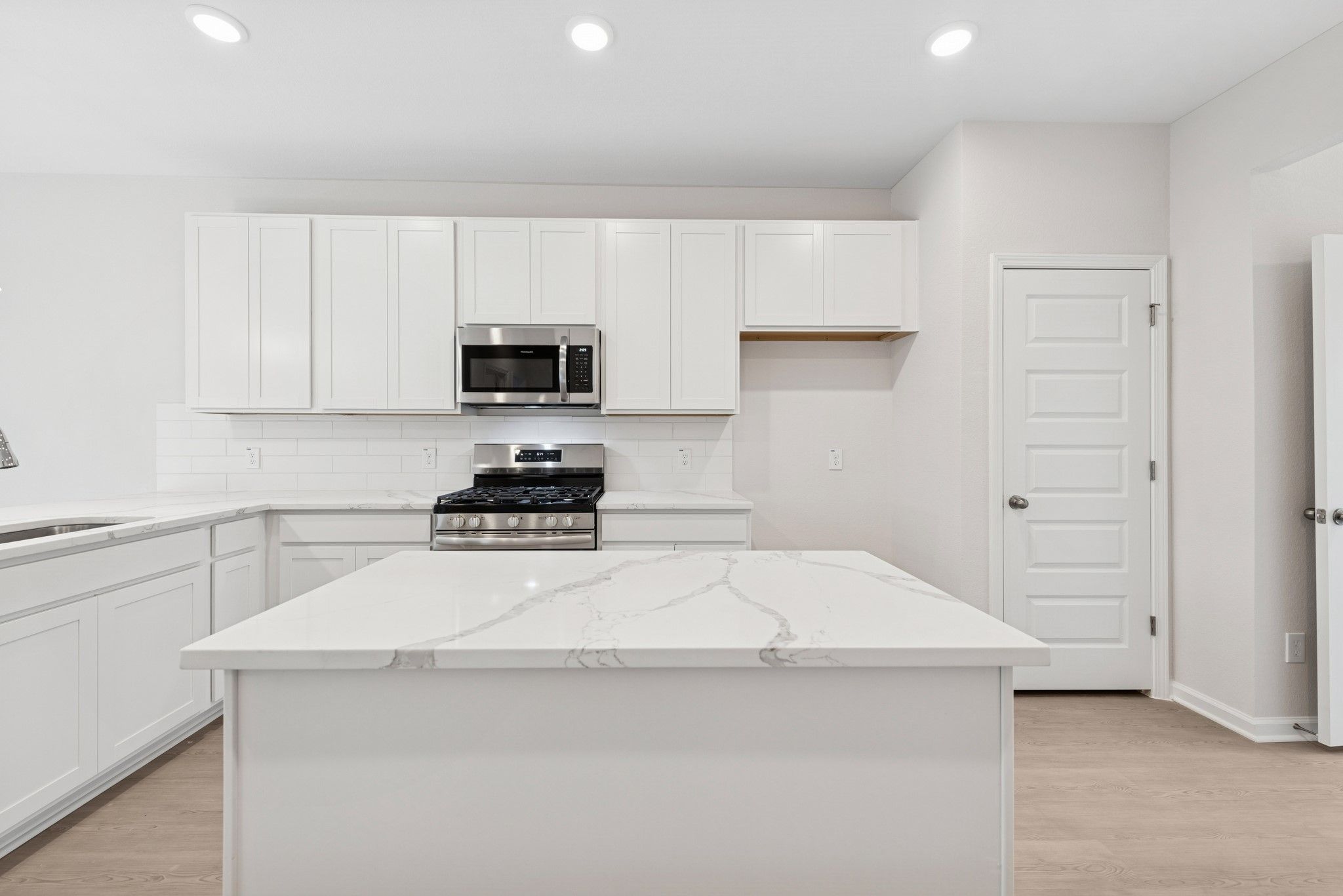 The Cardinal II- Kitchen. Photos of home shown are for illustration only; actual features, colors,