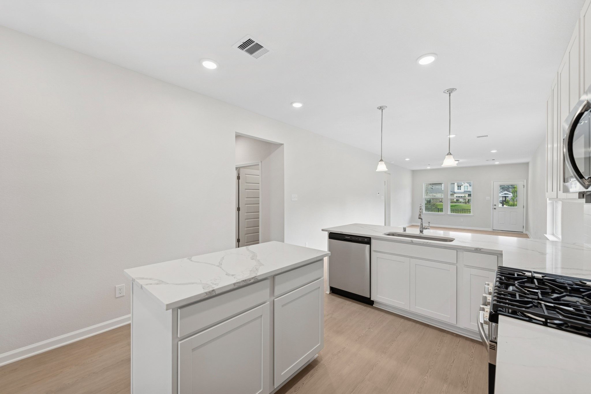 The Cardinal II- Kitchen. Photos of home shown are for illustration only; actual features, colors,