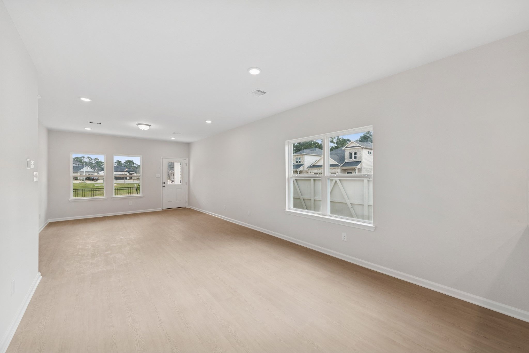 The Cardinal II- Dining Area into Family Room. Photos of home shown are for illustration only; actu