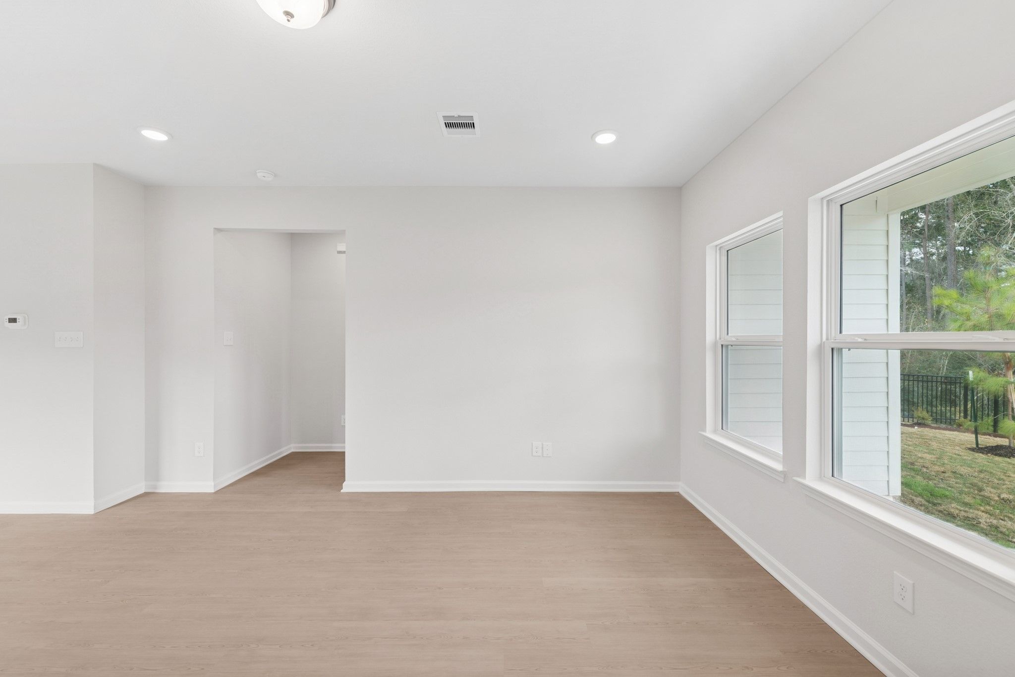 The Cardinal II- Family Room. Photos of home shown are for illustration only; actual features, colo