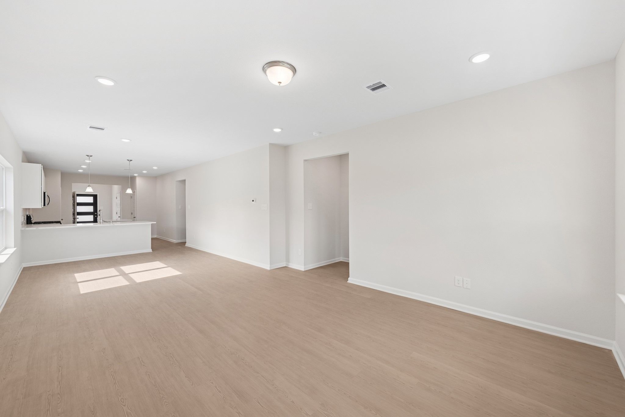 The Cardinal II- Family Room. Photos of home shown are for illustration only; actual features, colo