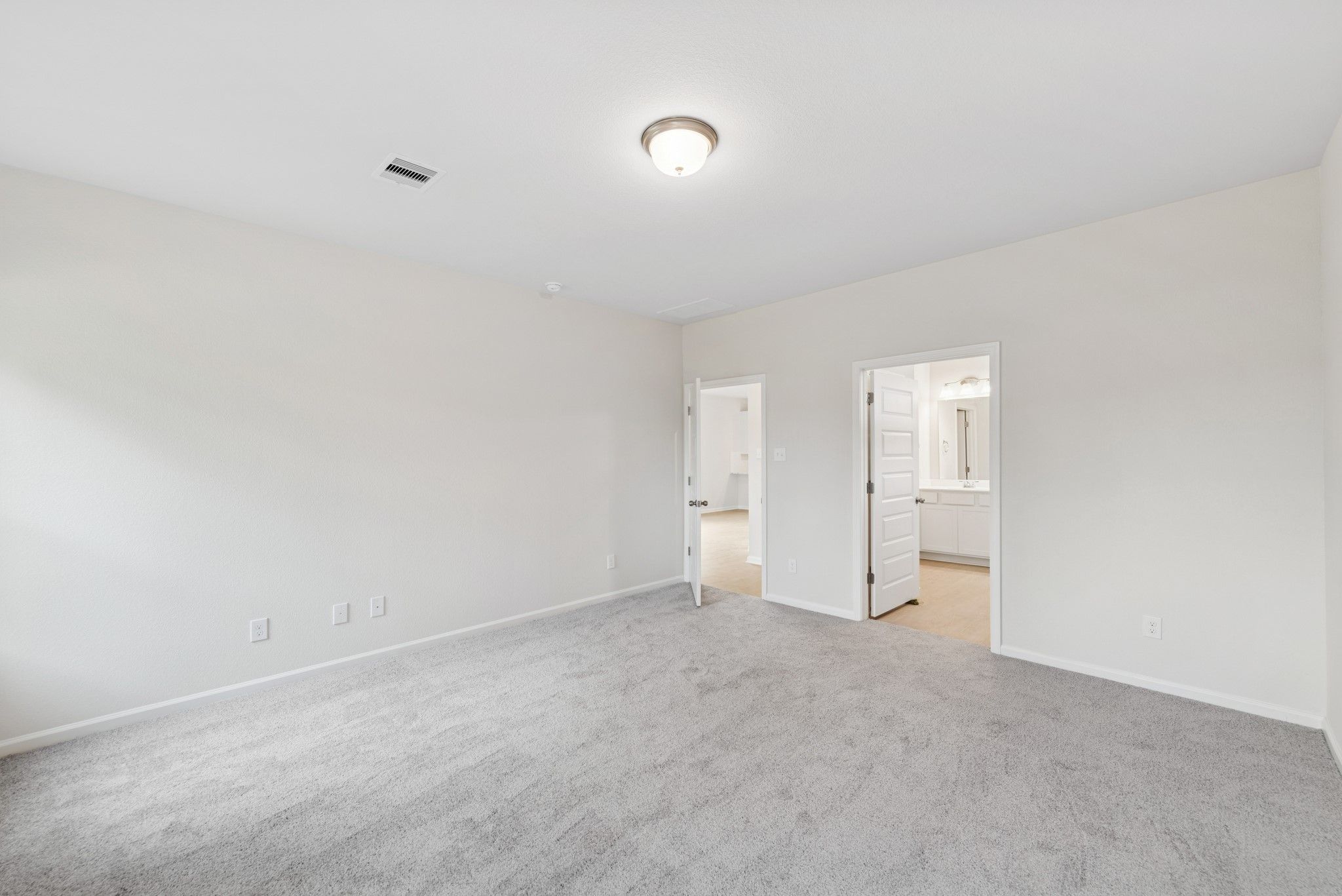 The Cardinal II- Primary Suite. Photos of home shown are for illustration only; actual features, co