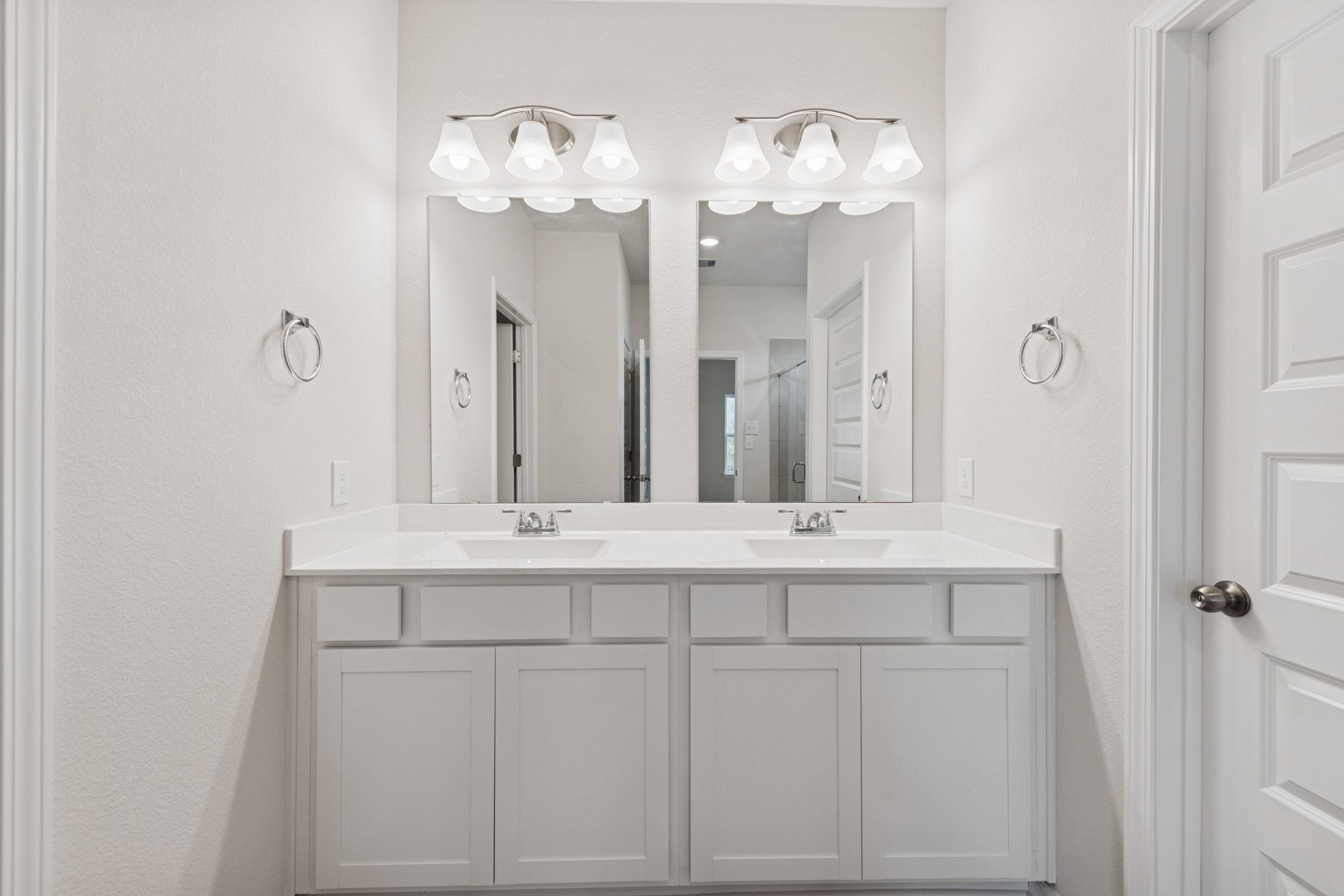 The Cardinal II- Primary Bathroom with Dual Vanities. Photos of home shown are for illustration onl