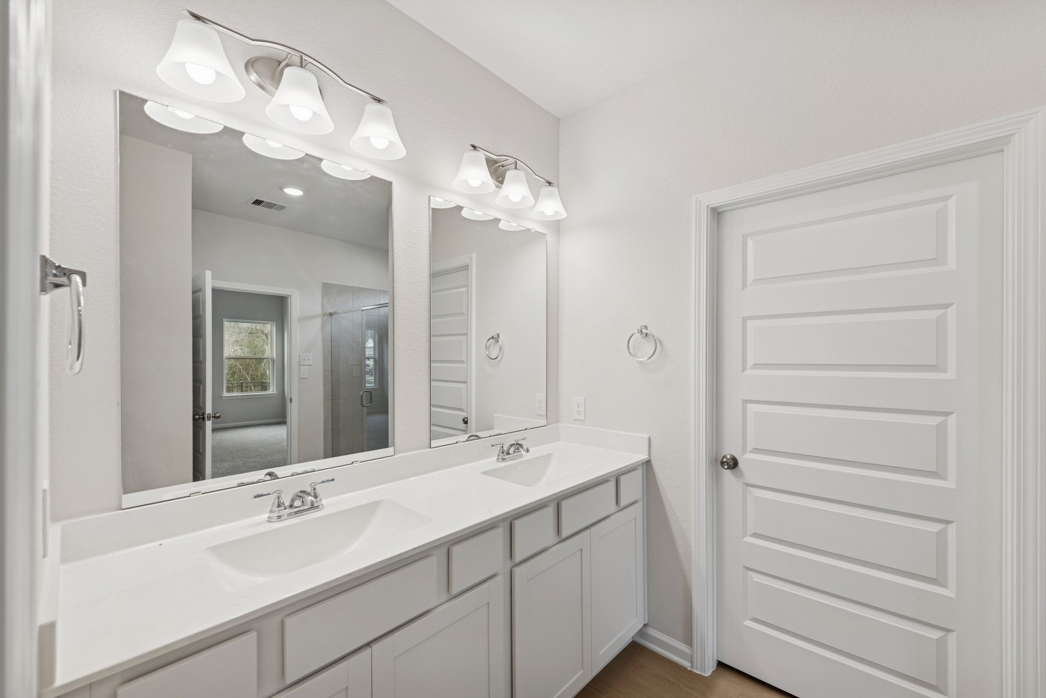 The Cardinal II- Primary Bathroom with Dual Vanities. Photos of home shown are for illustration onl