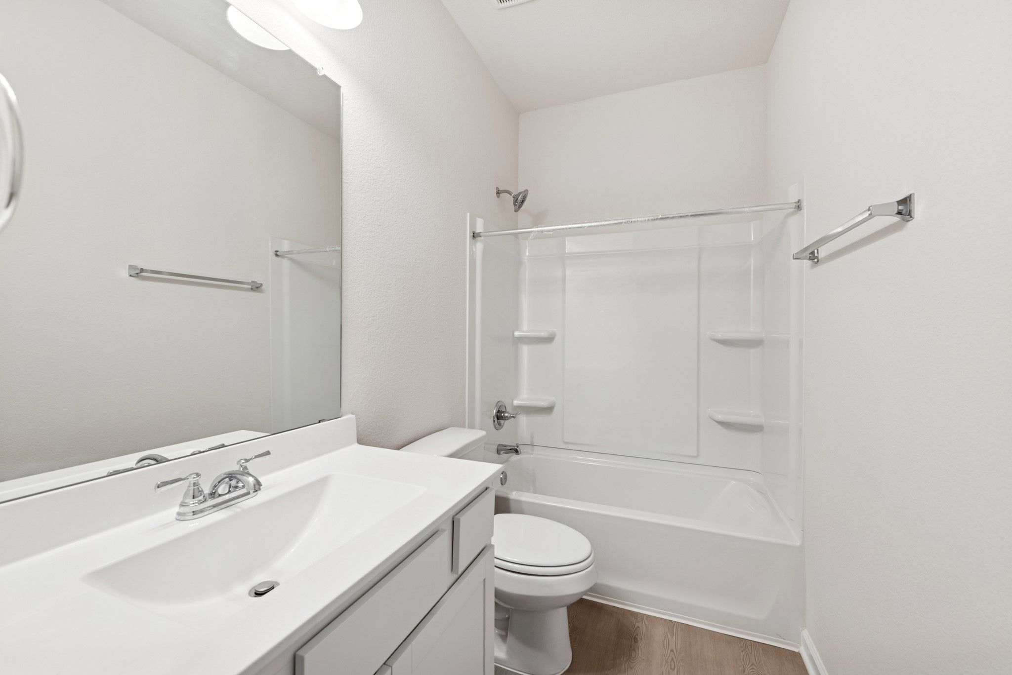 The Cardinal II- Hall Bath 2. Photos of home shown are for illustration only; actual features, colo