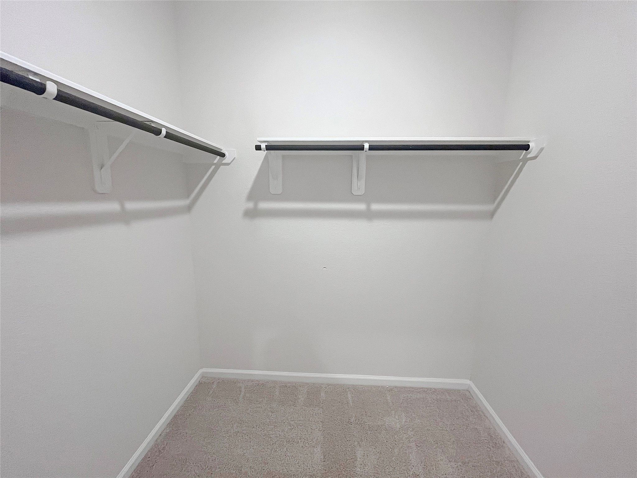 The Robin II- Primary Walk-In Closet. Sample image to be used for example only, colors, options and
