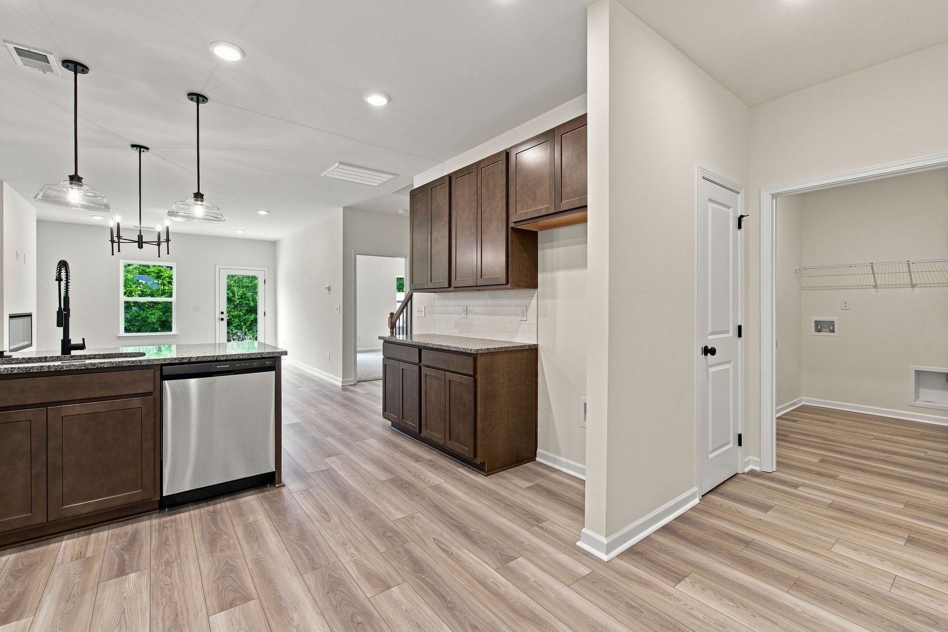 These pictures are of another unit of the same floor plan. Design selections will vary.