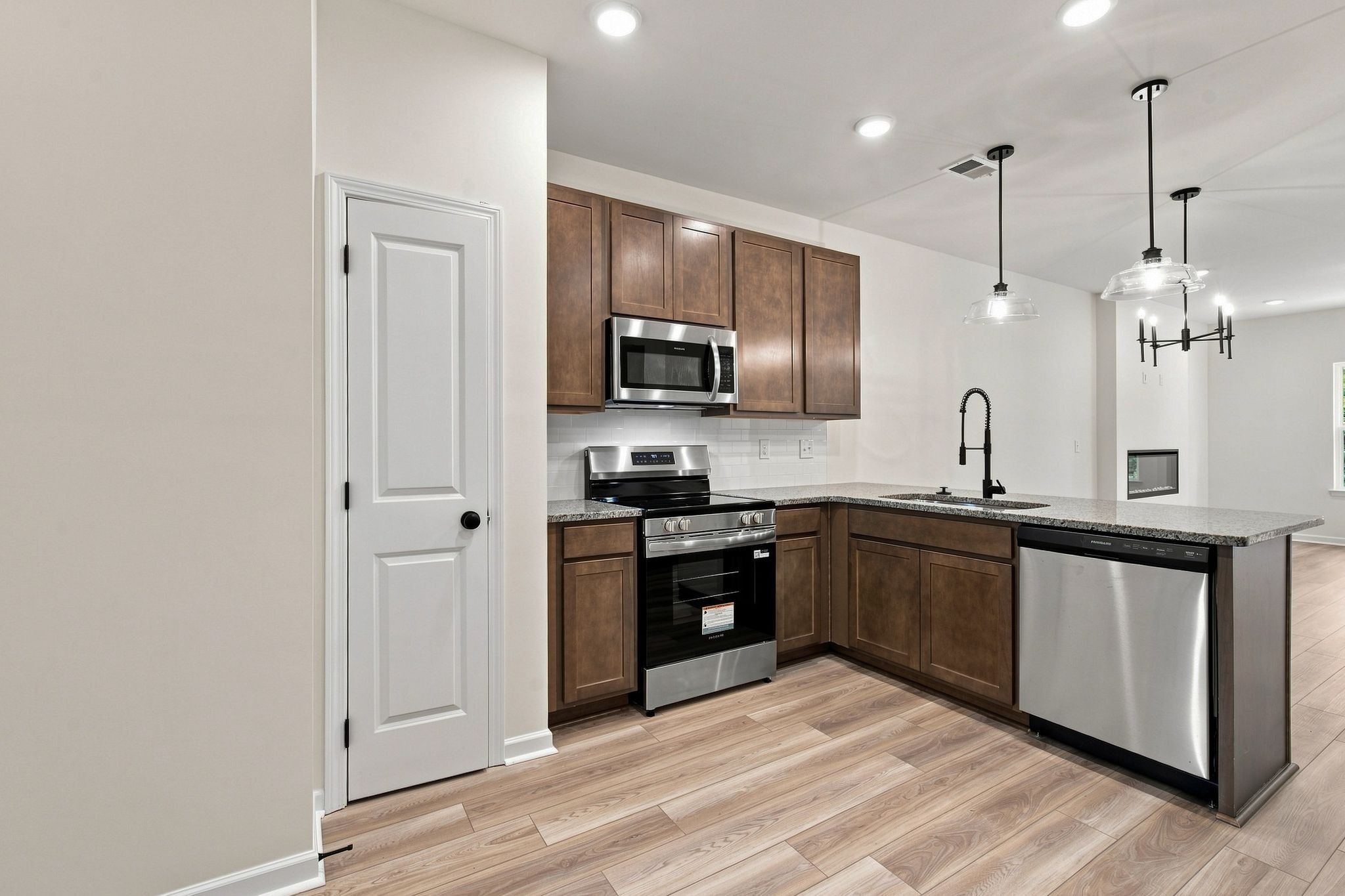 These pictures are of another unit of the same floor plan. Design selections will vary.