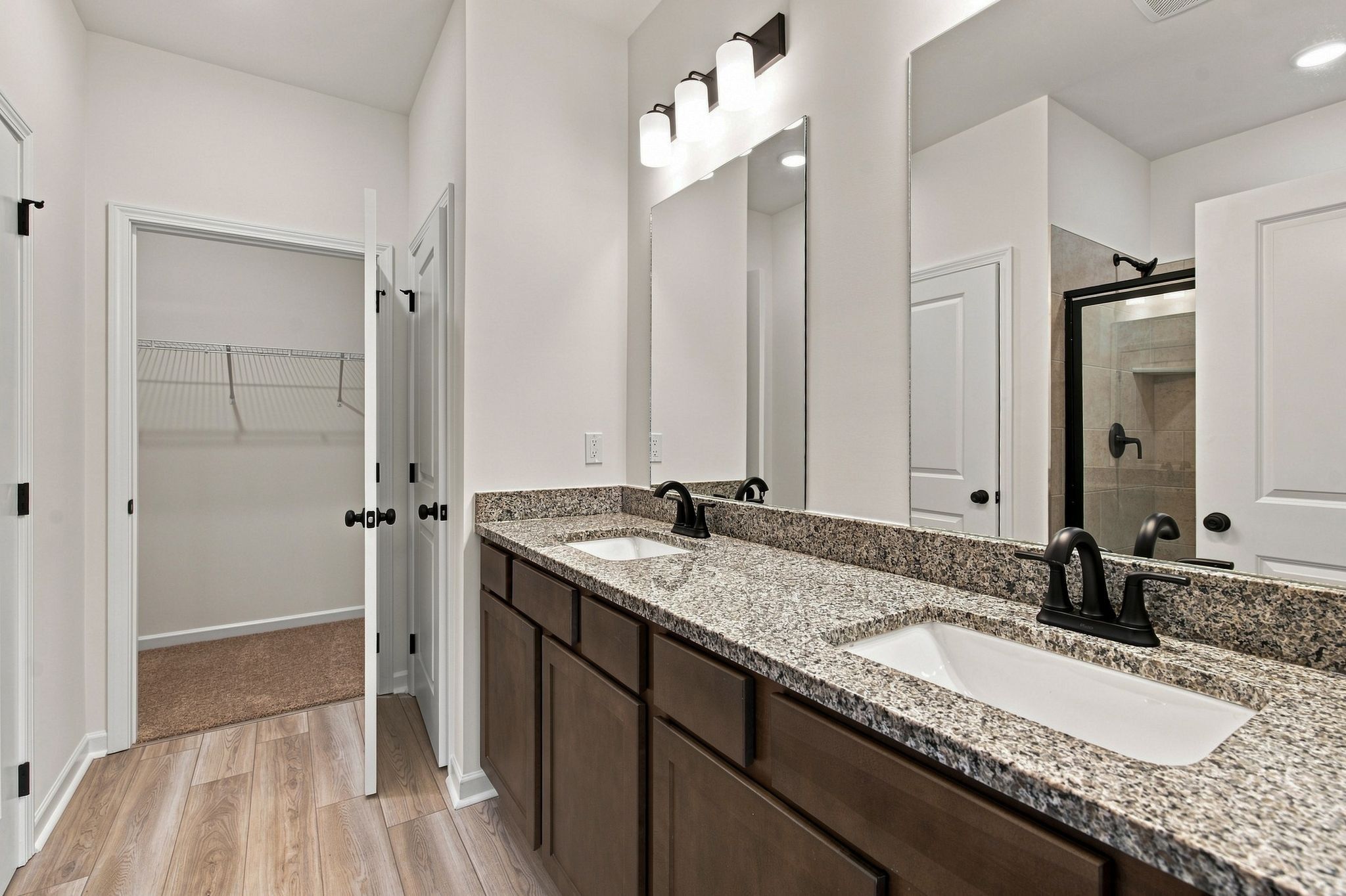 These pictures are of another unit of the same floor plan. Design selections will vary.