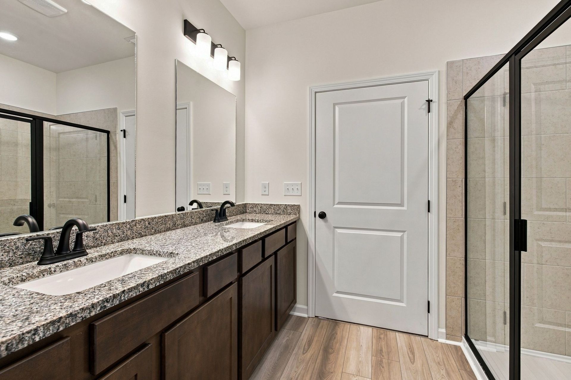 These pictures are of another unit of the same floor plan. Design selections will vary.