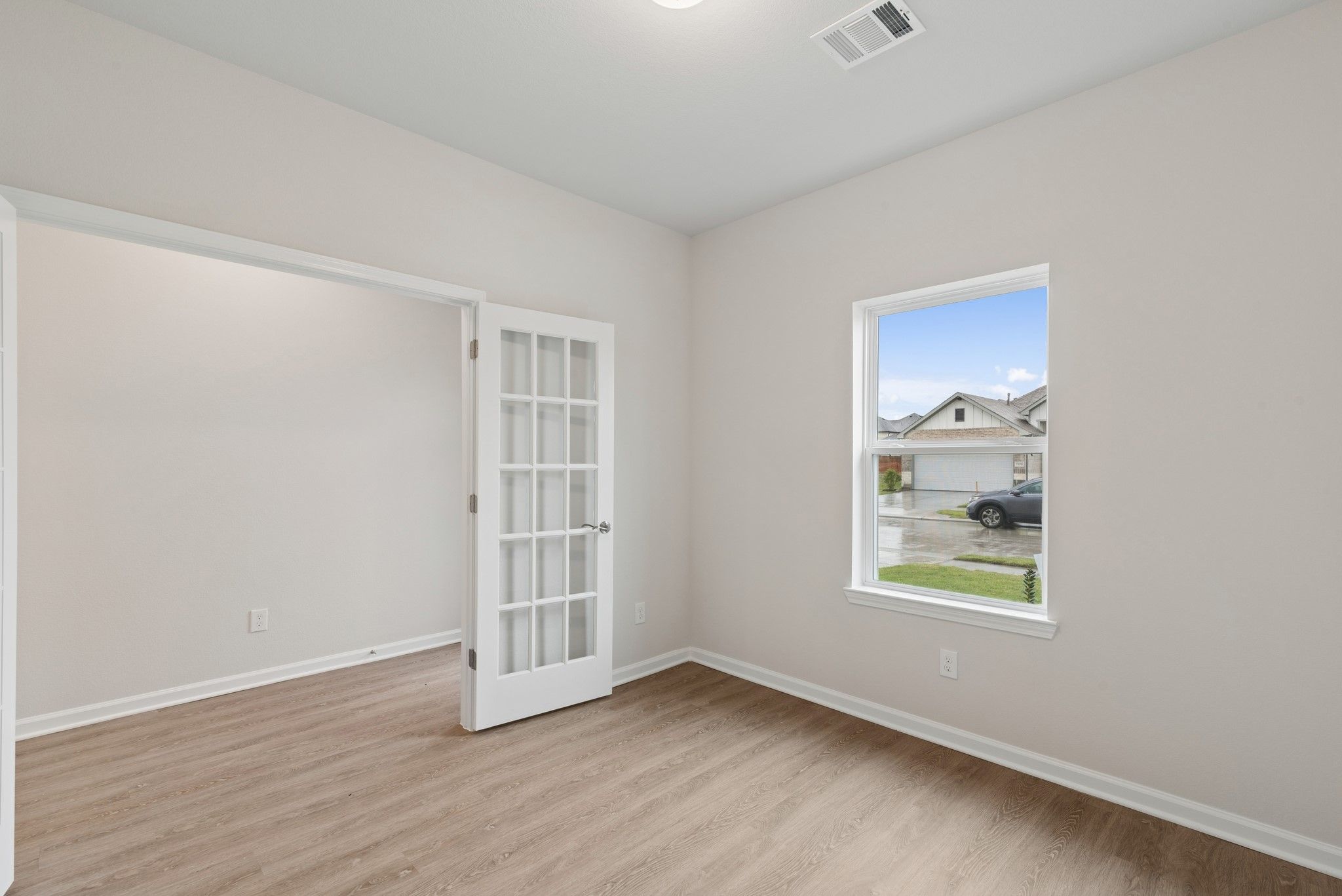 The Oakshire II- Study with French Doors. Home under construction, photo used for illustrative purp
