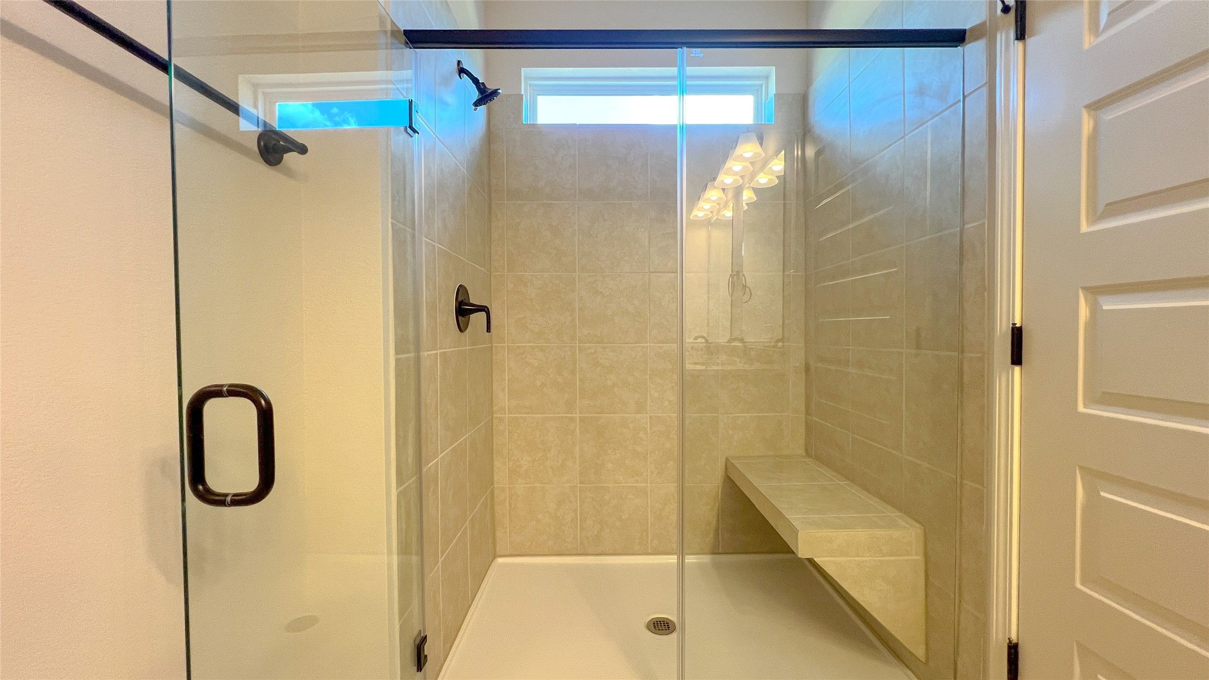 The Blue Jay II- Primary Bathroom with Large Walk-in Shower with Bench Seat