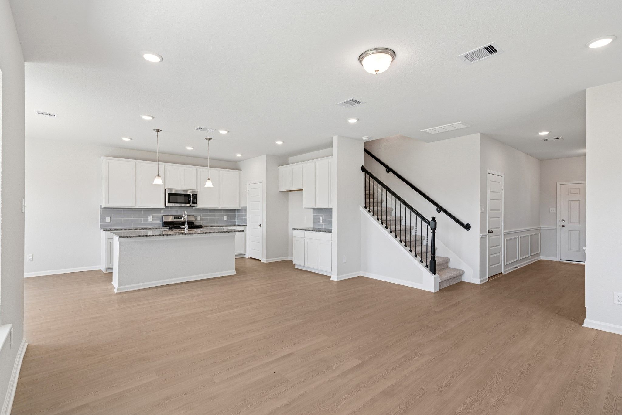The Oriole II- Family Room into Kitchen