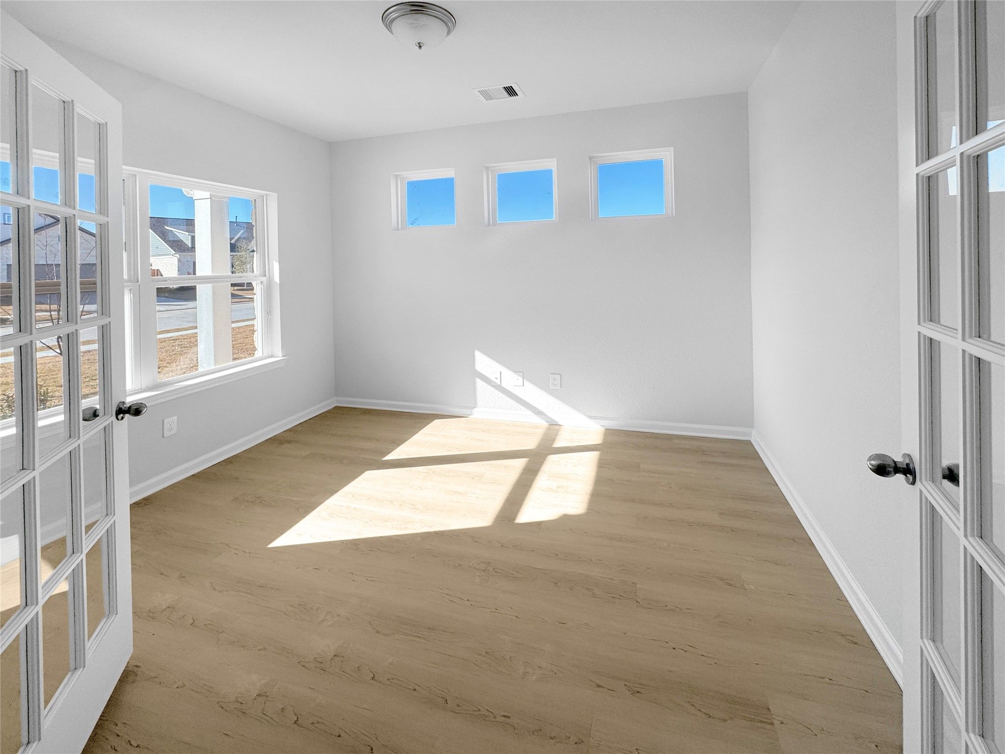 The Waring III- Study with French Doors. Under construction, options, upgrades and colors will vary