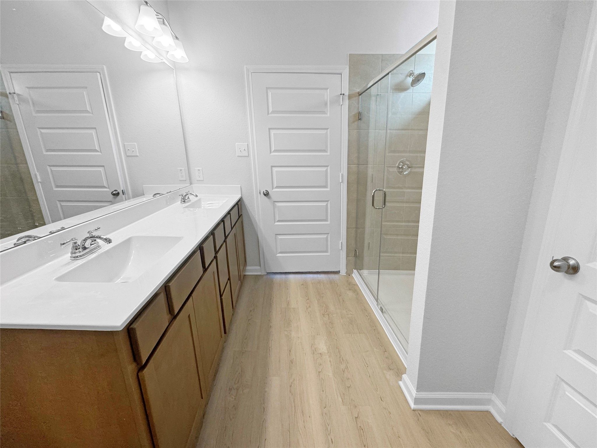 The Waring III- Primary Bathroom with Walk-In Shower, Garden tub not pictured. Under construction,