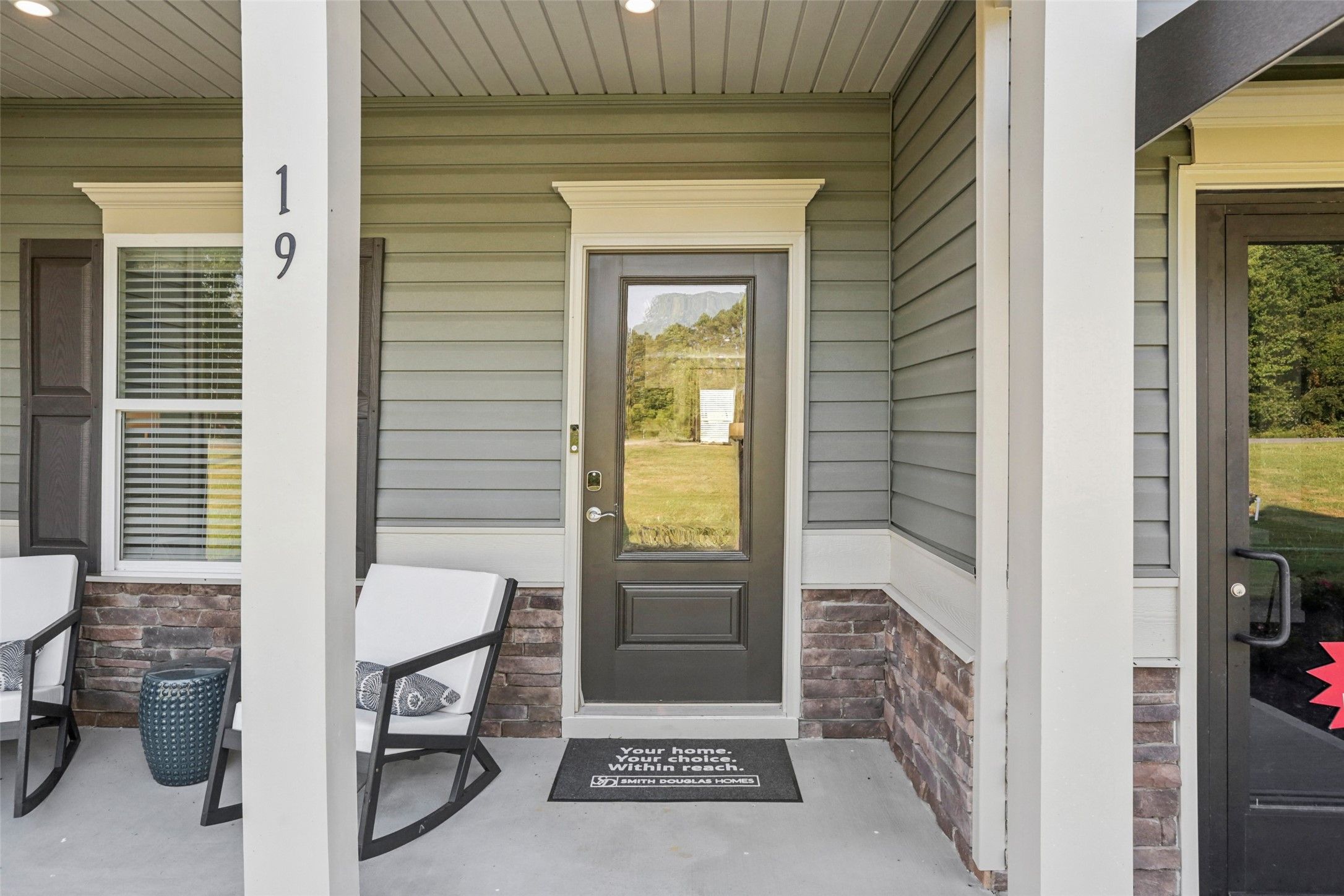 The Avondale- Front Porch. Sample image for illustration; upgrades, options, and colors may vary.