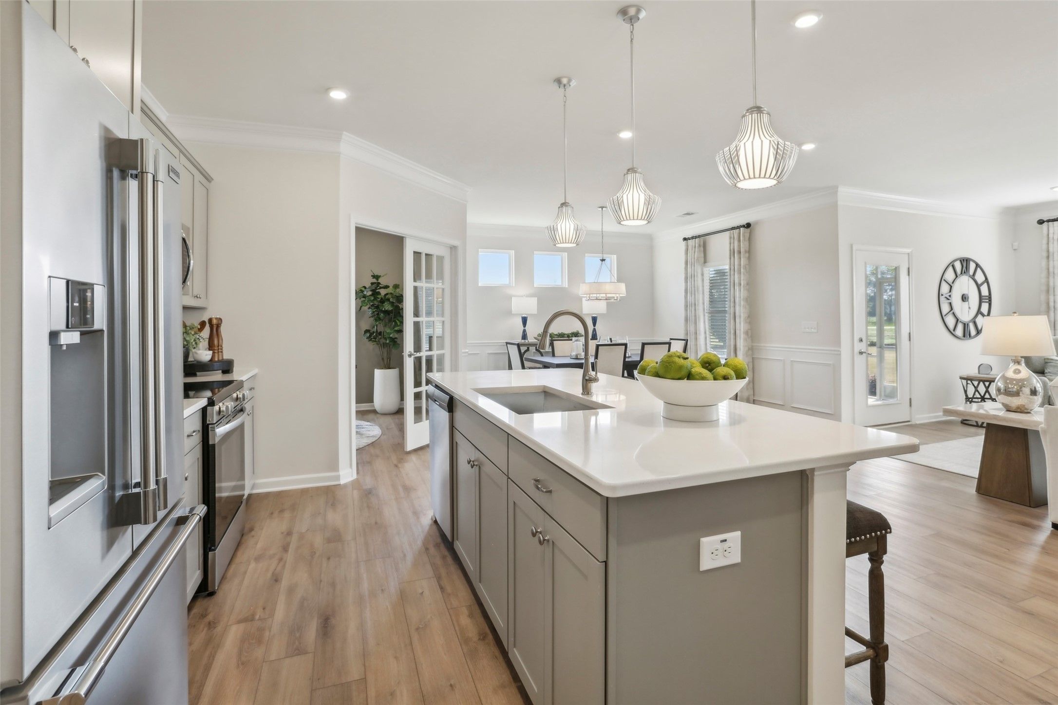 The Avondale-Kitchen into Family Room. Sample image for illustration; upgrades, options, and colors