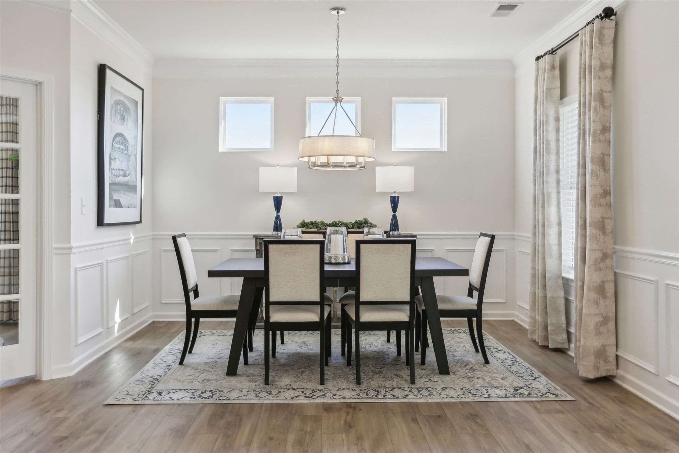 The Avondale- Dining Area. Sample image for illustration; upgrades, options, and colors may vary.