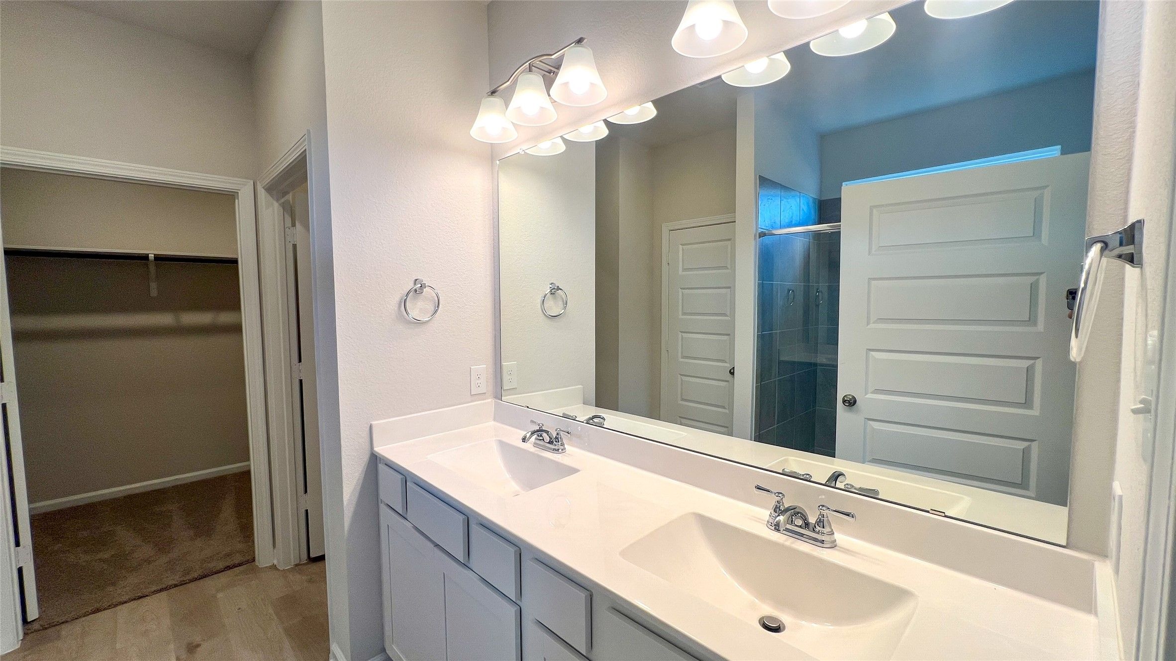 The Sparrow II- Primary Bathroom with dual vanities. Sample floor plan image for illustration; upgr