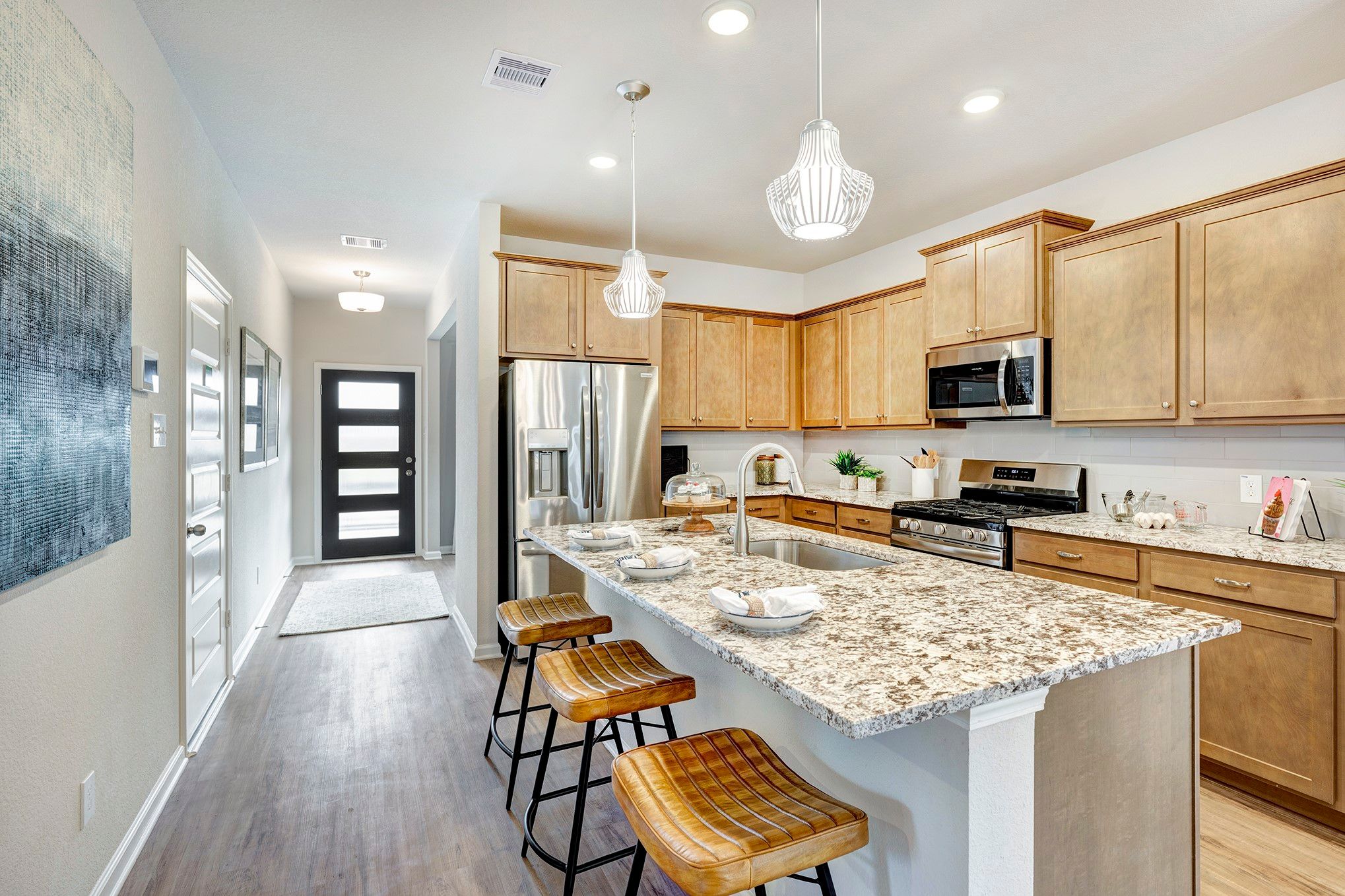 Kitchen and Foyer. Sample image for illustration; upgrades, options, and colors may vary.