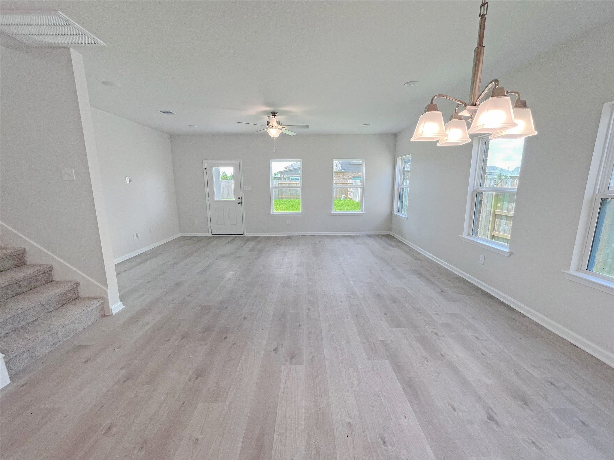 The Georgetown II- Dining into Family Room. Sample image for illustration; upgrades, options, and c