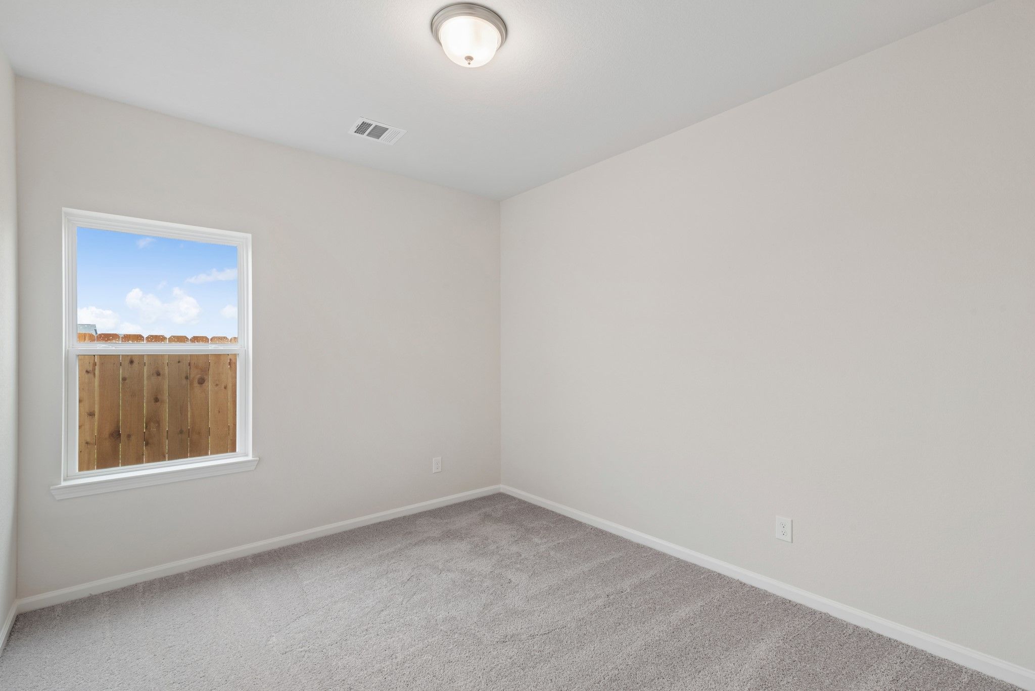 The Oakshire II- Bedroom 2.  Sample image for illustration; upgrades, options, and colors may vary.
