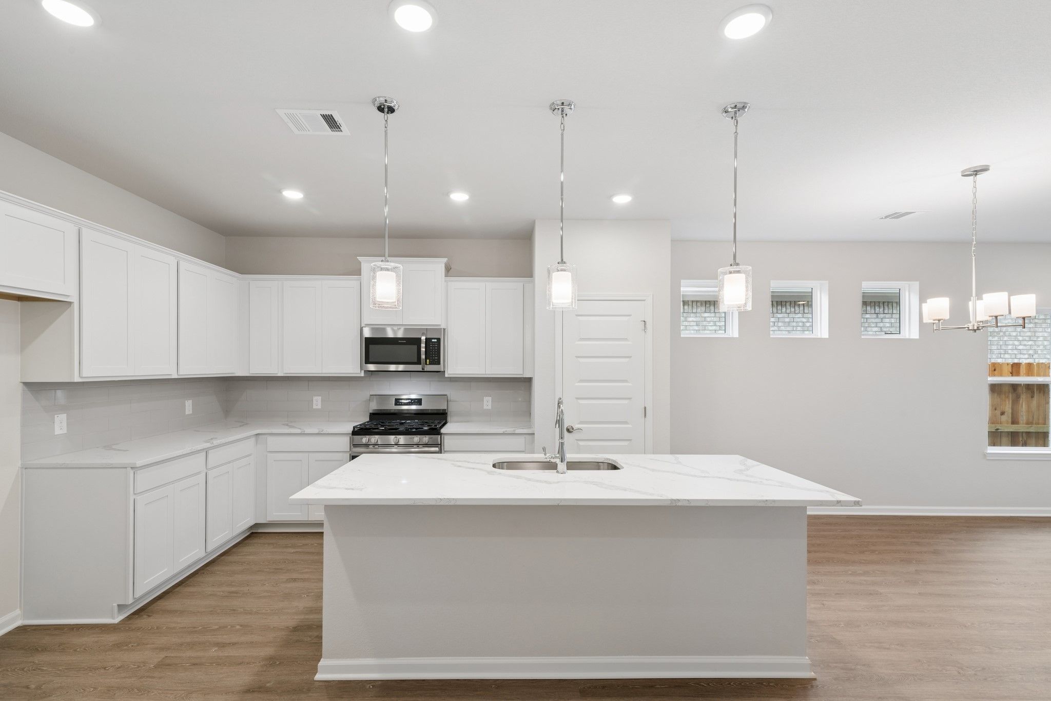 The Oakshire II- Kitchen with Island.  Sample image for illustration; upgrades, options, and colors