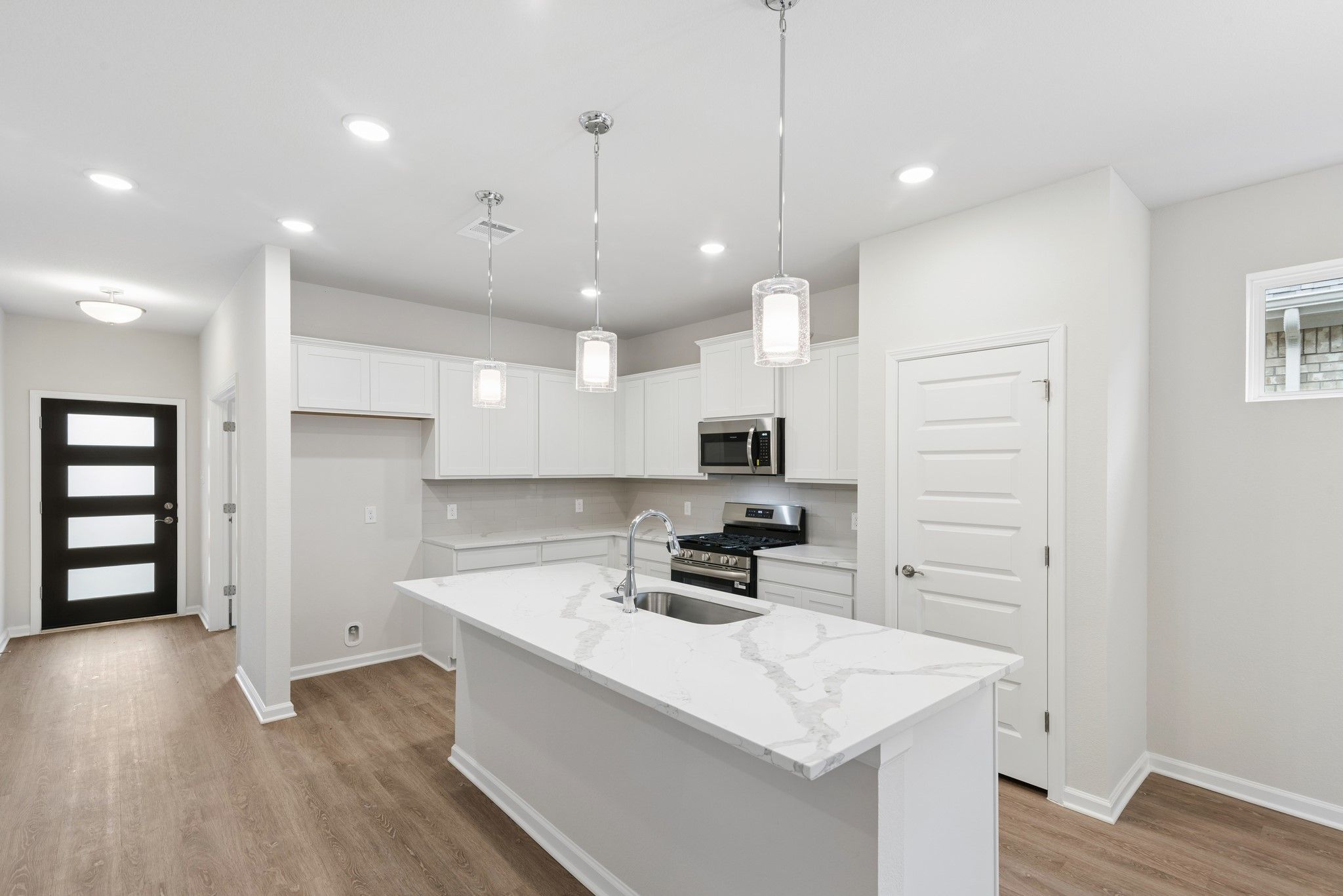 The Oakshire II- Kitchen with Island.  Sample image for illustration; upgrades, options, and colors