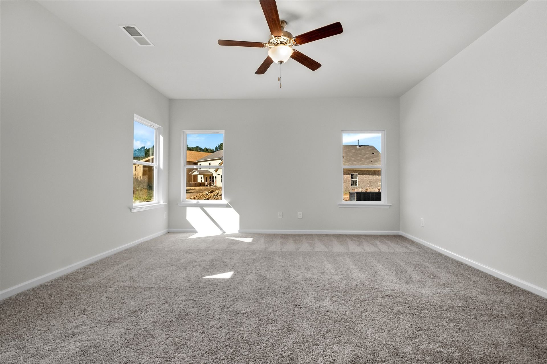 The Coleman- Family Room. Home under construction, photo used for illustrative purposes only, colors and options will vary.