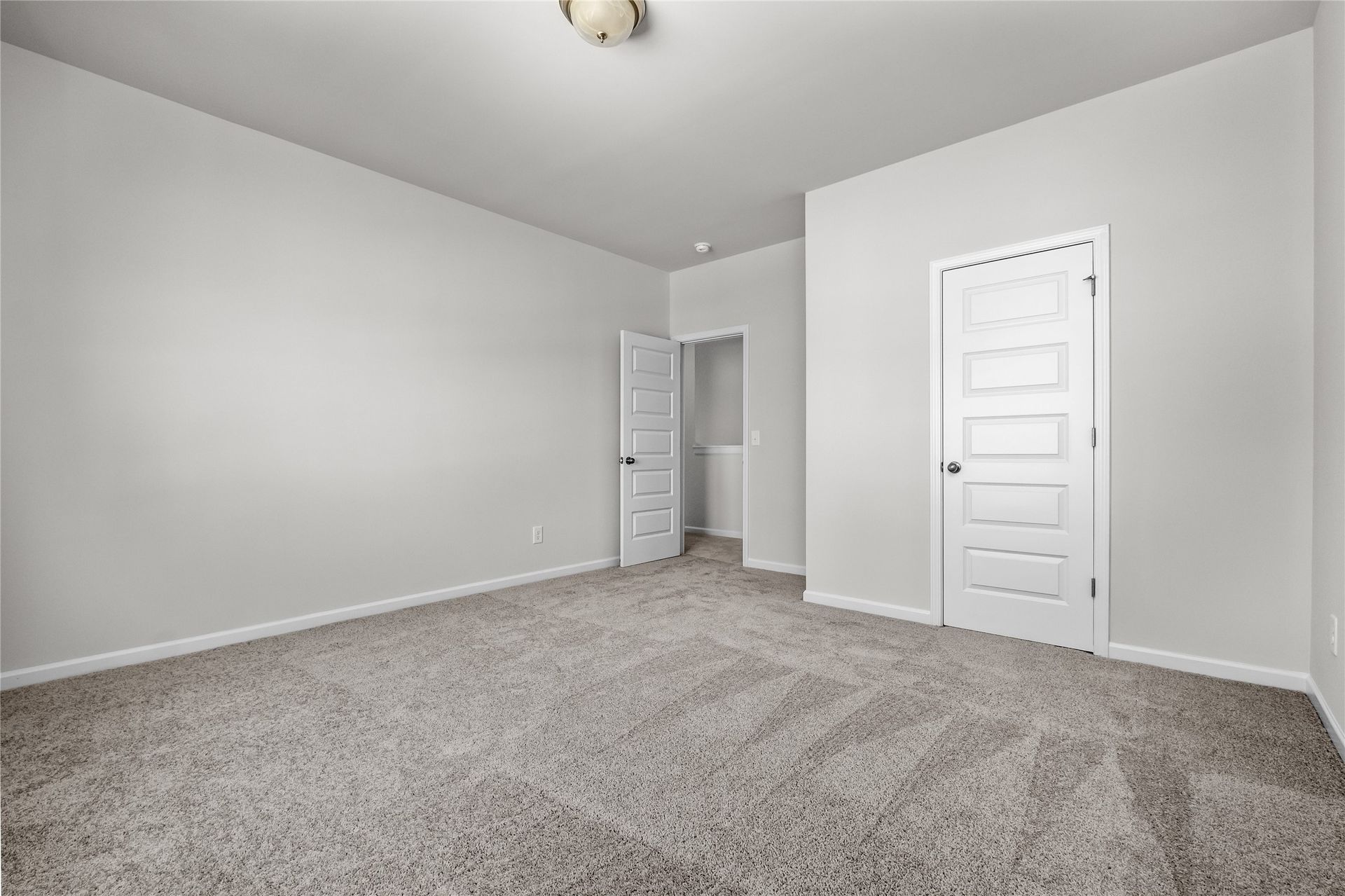 The Coleman- Secondary Bedroom. Home under construction, photo used for illustrative purposes only, colors and options will vary.