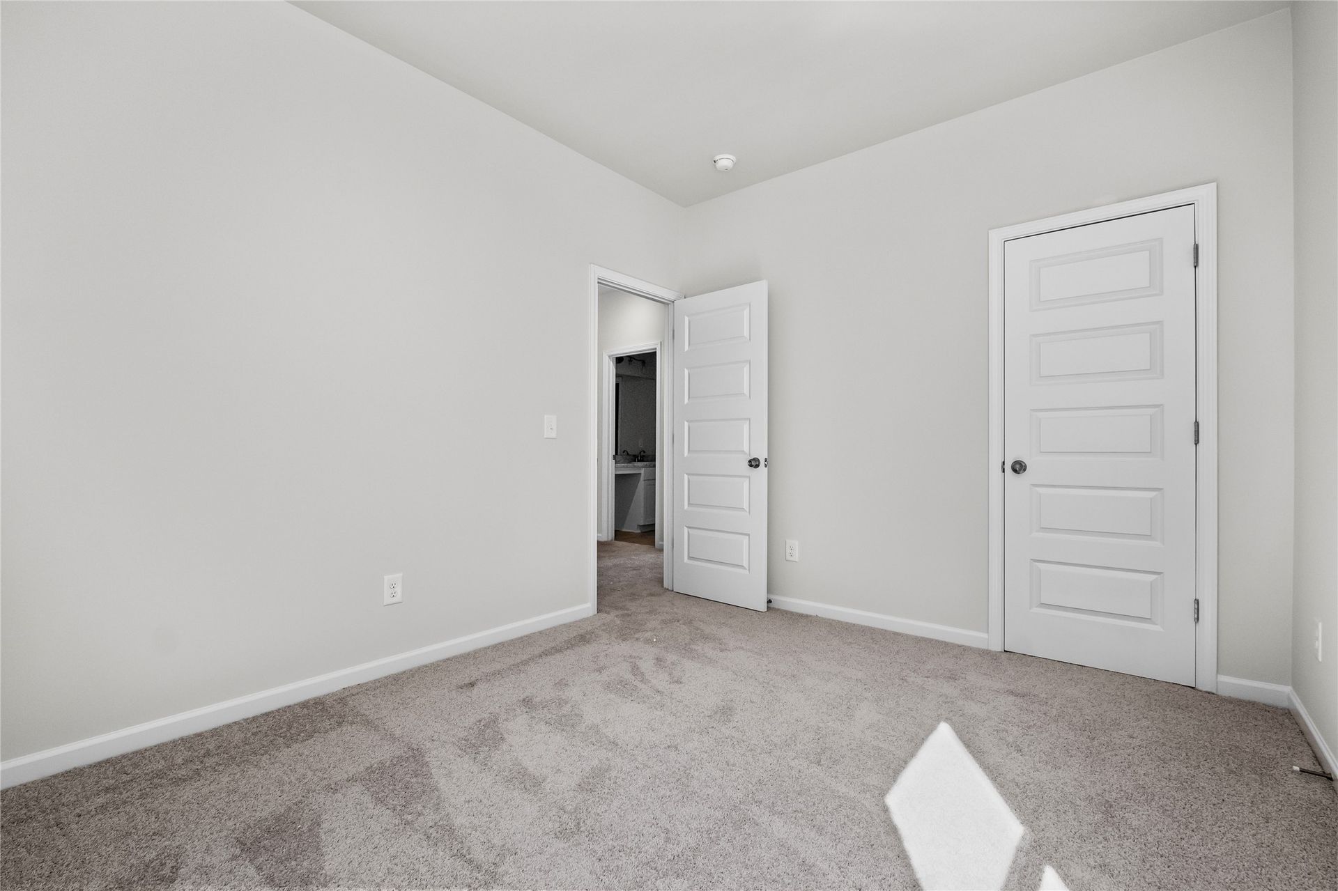The Coleman- Secondary Bedroom. Home under construction, photo used for illustrative purposes only, colors and options will vary.