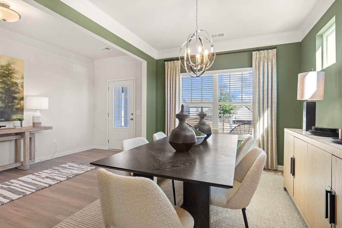 The James- Dining Room into Entry. Home under construction, sample image for illustration; upgrades, options, and colors may vary.