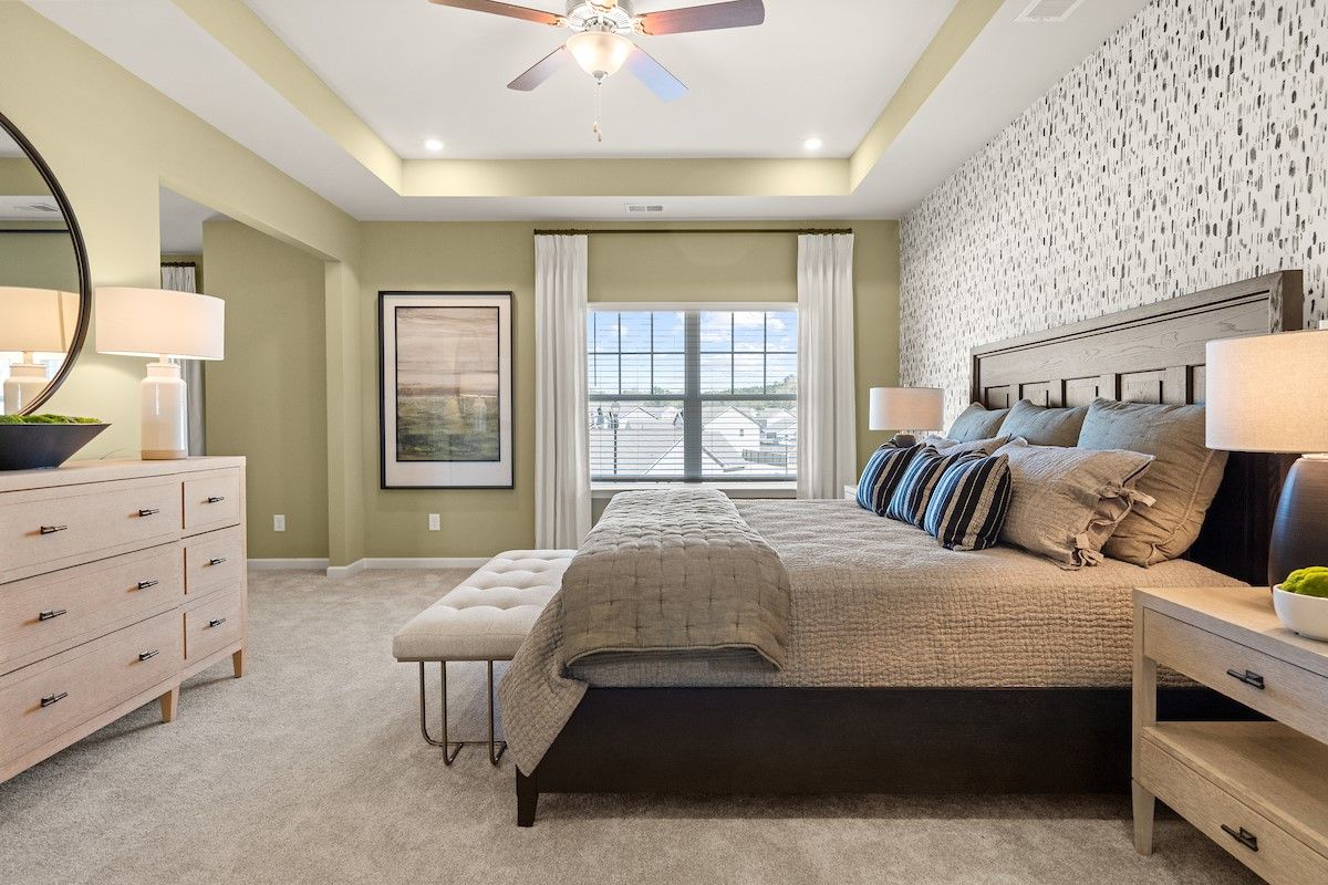 The James- Primary Suite with Sitting Room (French Doors not pictured). Home under construction, sample image for illustration; upgrades, options, and colors may vary.