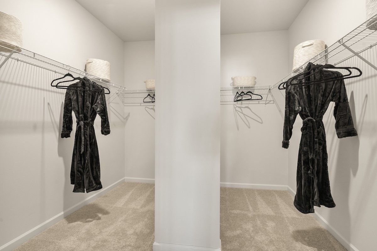 The James- Primary Suite Closet. Home under construction, sample image for illustration; upgrades, options, and colors may vary.