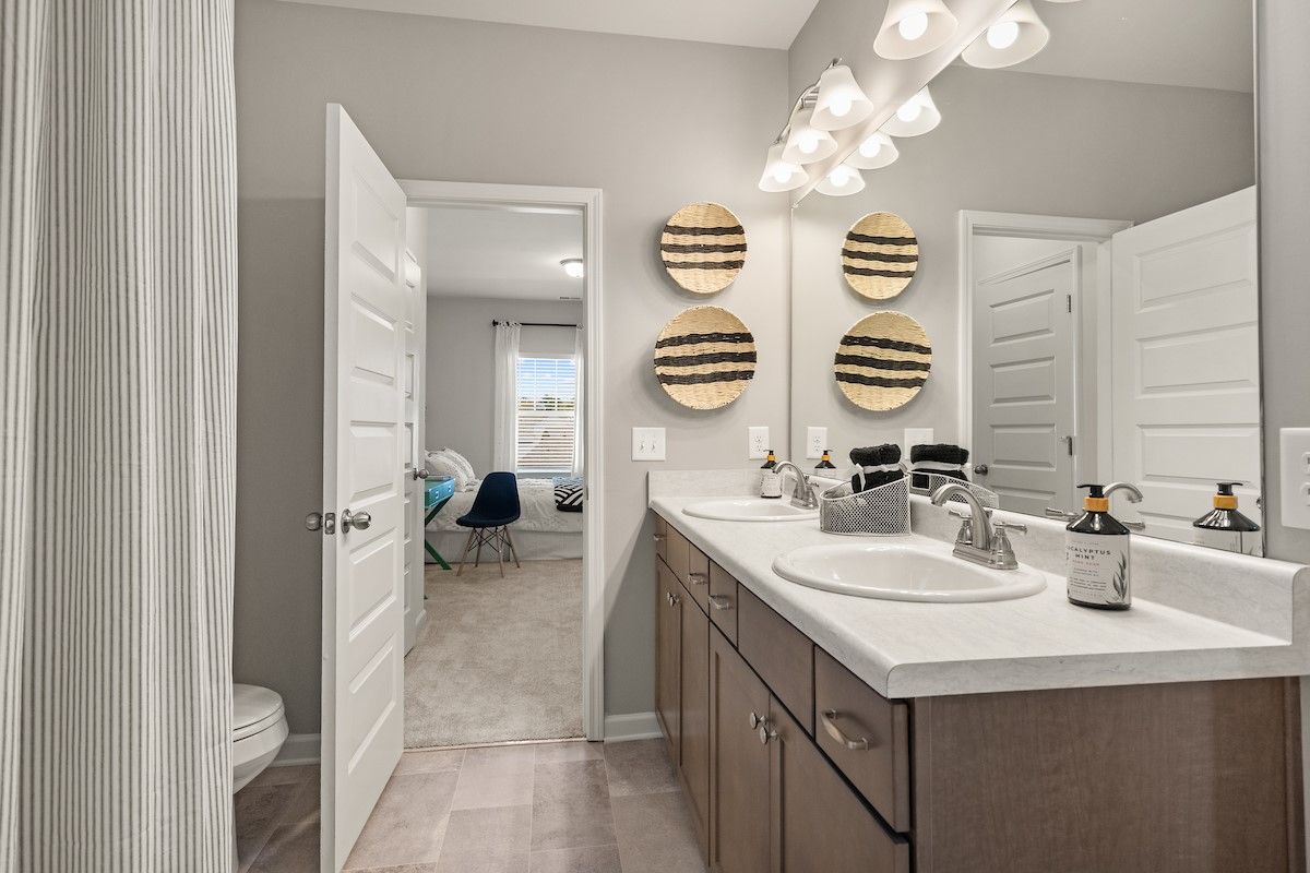 The James- Jack and Jill Bath. Home under construction, sample image for illustration; upgrades, options, and colors may vary.