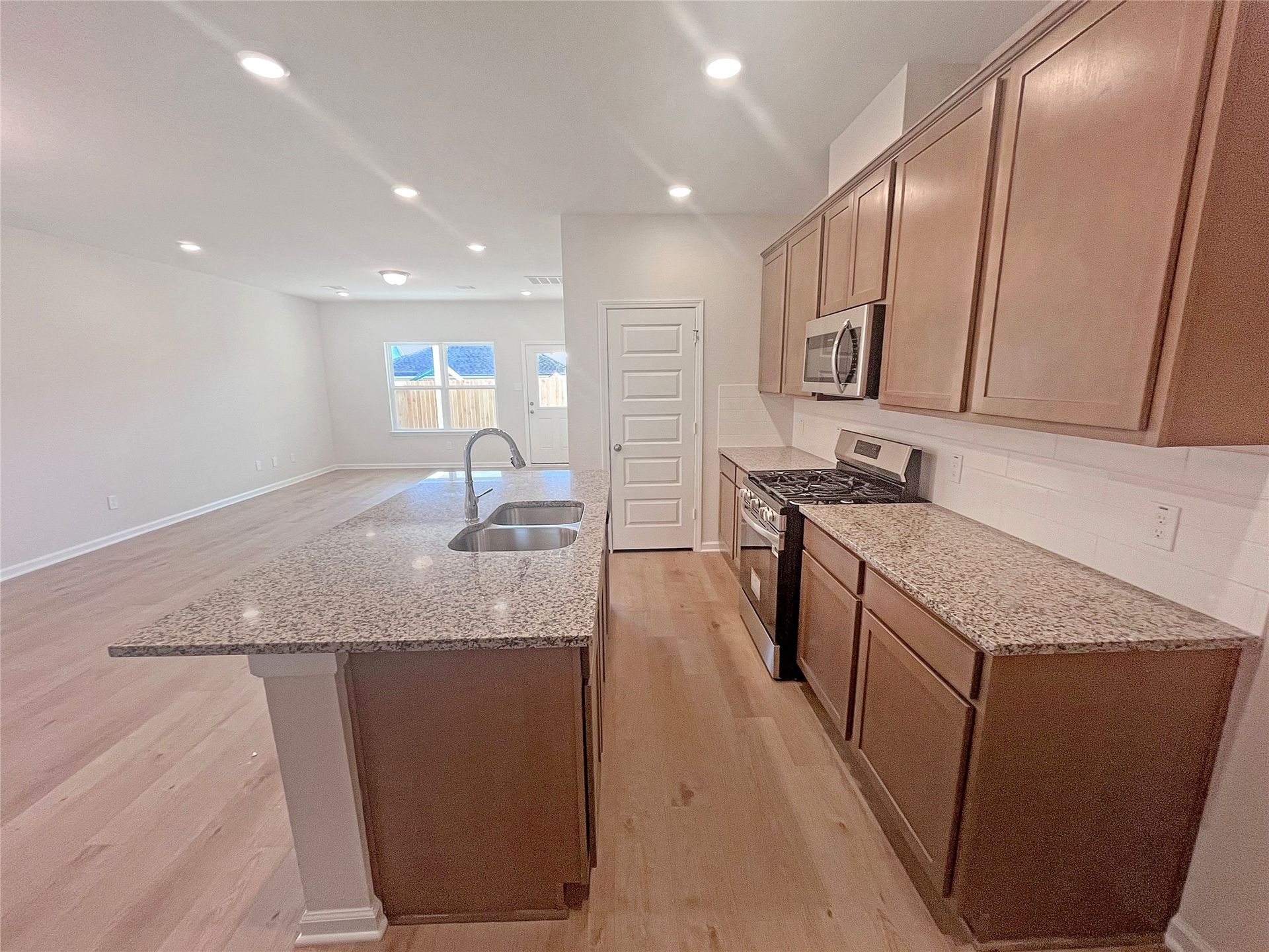 The Robin II- Kitchen. Sample image to be used for example only, colors, options and upgrades vary.