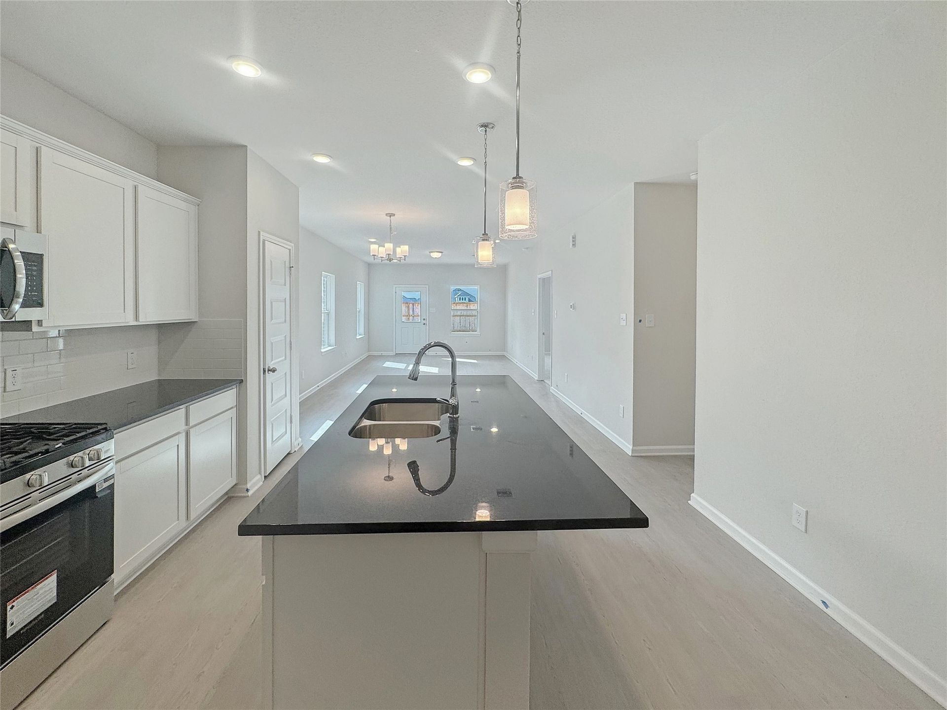 The Piedmont- Kitchen into Dining Area and Family Room